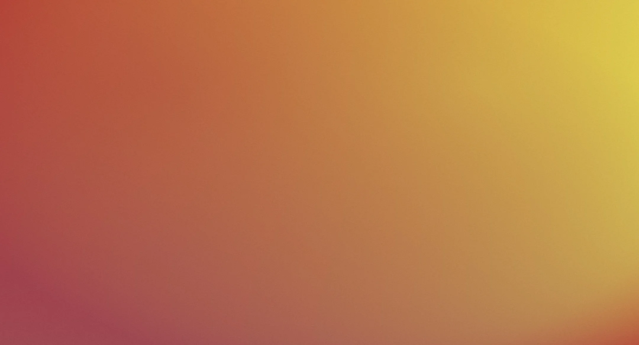 A gradient background transitioning from reddish to yellowish hues.