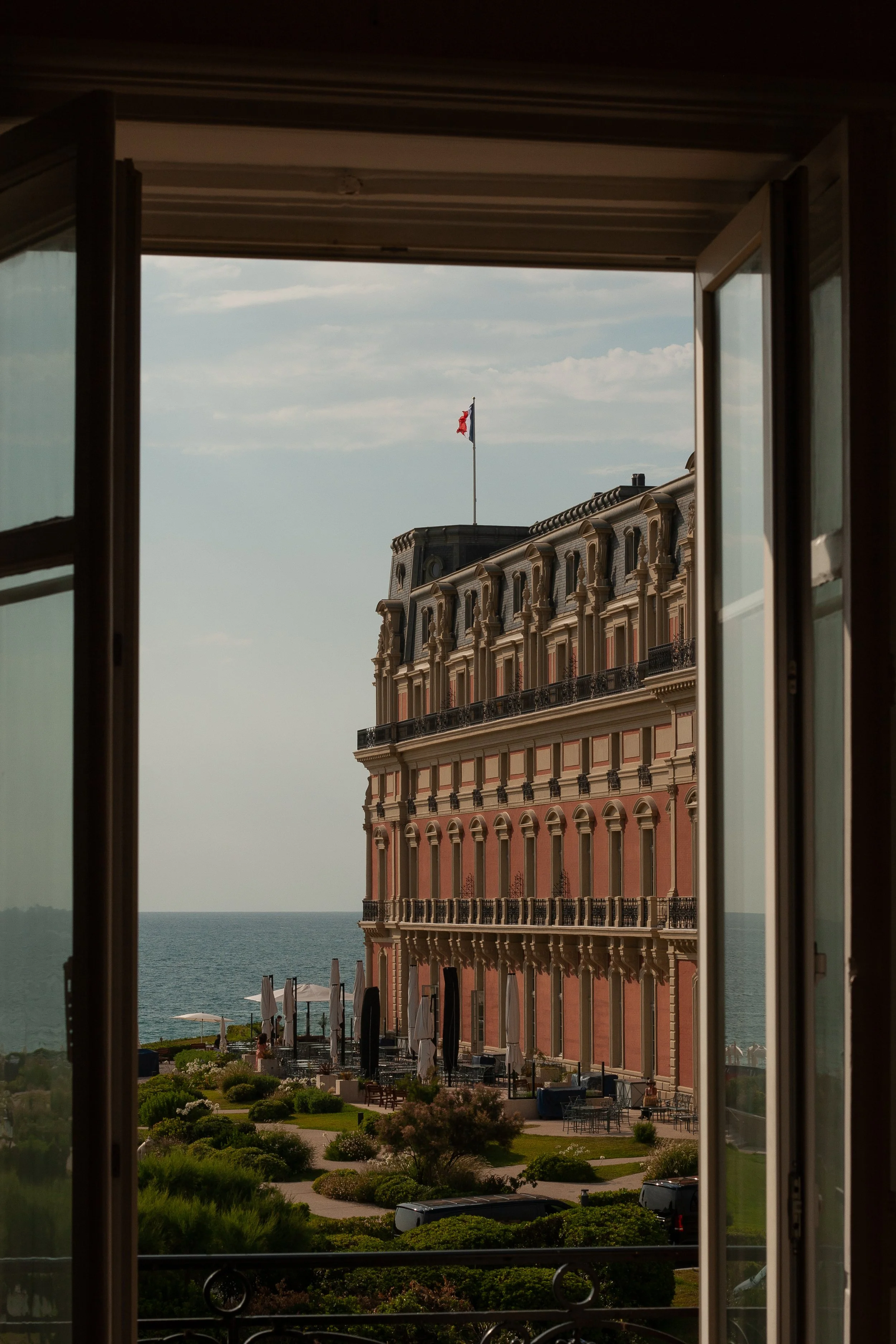 Luxury hospitality photography of Hôtel du Palais in Biarritz, a historic seafront hotel overlooking the Atlantic.