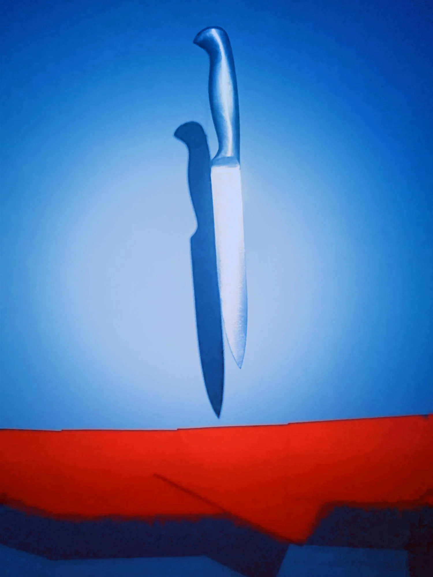 A small, sharply curved white and metallic sword placed on a blue and red background.