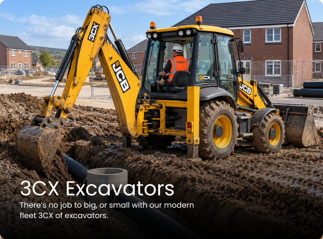 JCB 3CX backhoe loader excavating a trench at a residential construction site