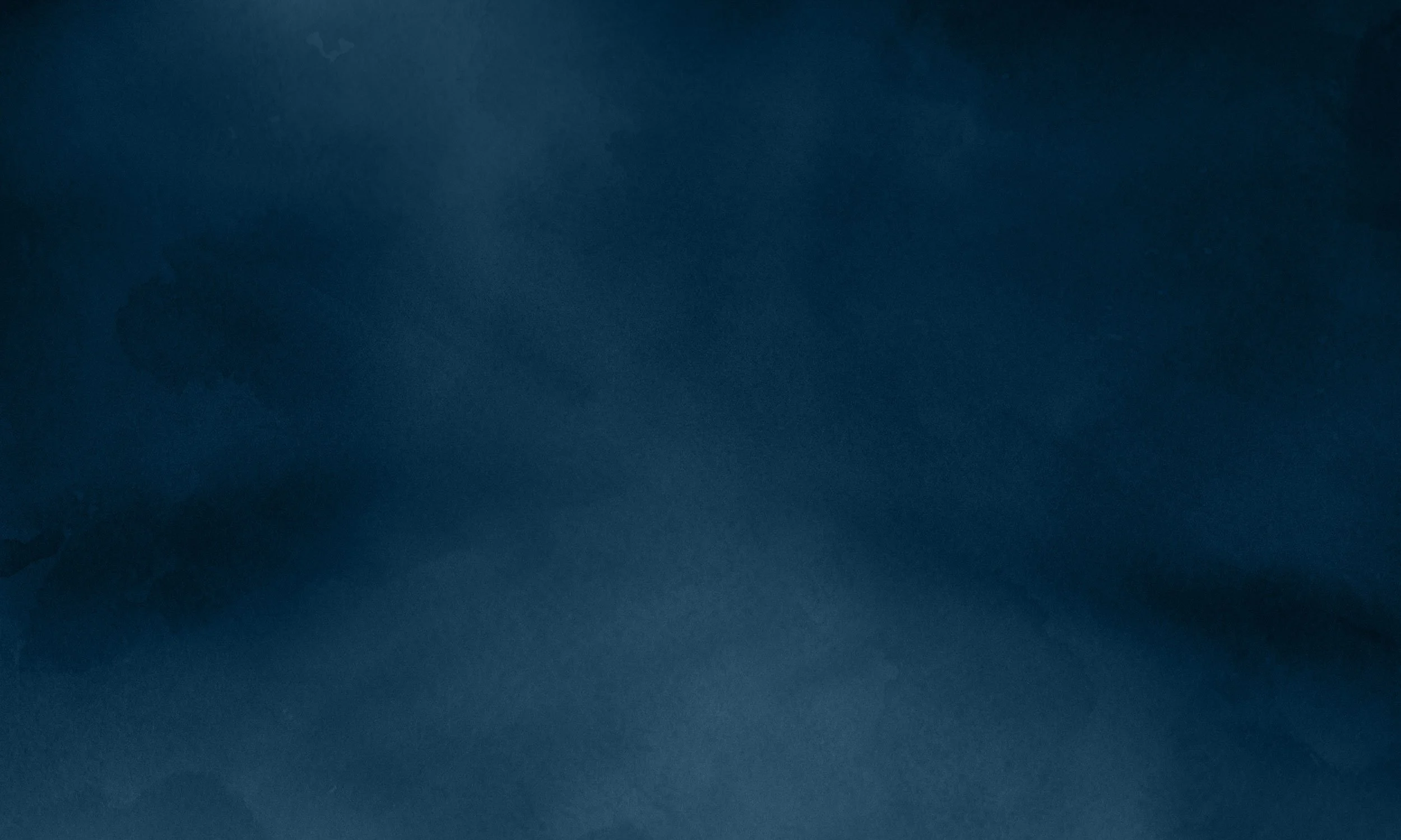 A dark blue, textured background with subtle gradient variations.