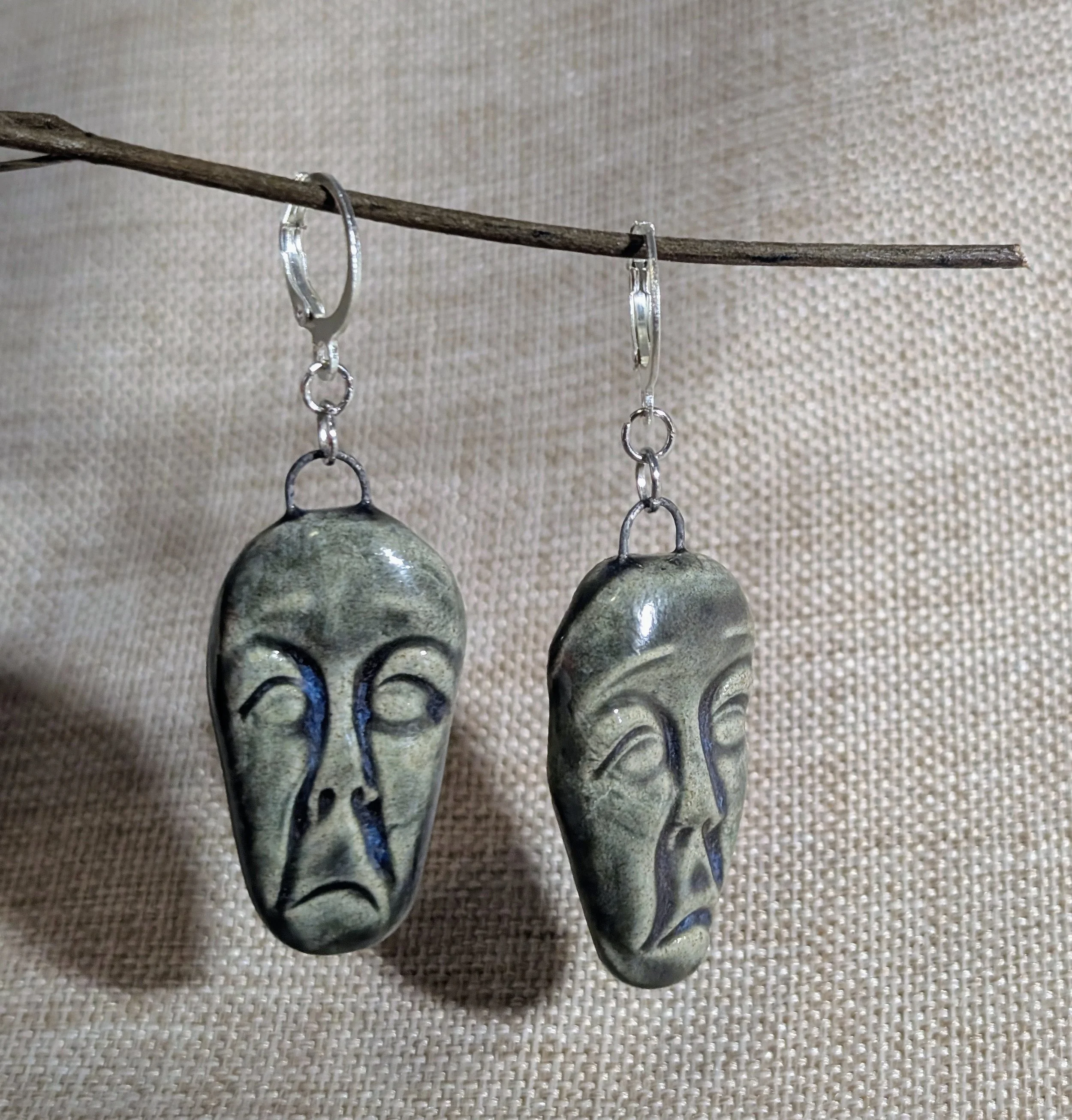 Boucles d'oreilles avec visage