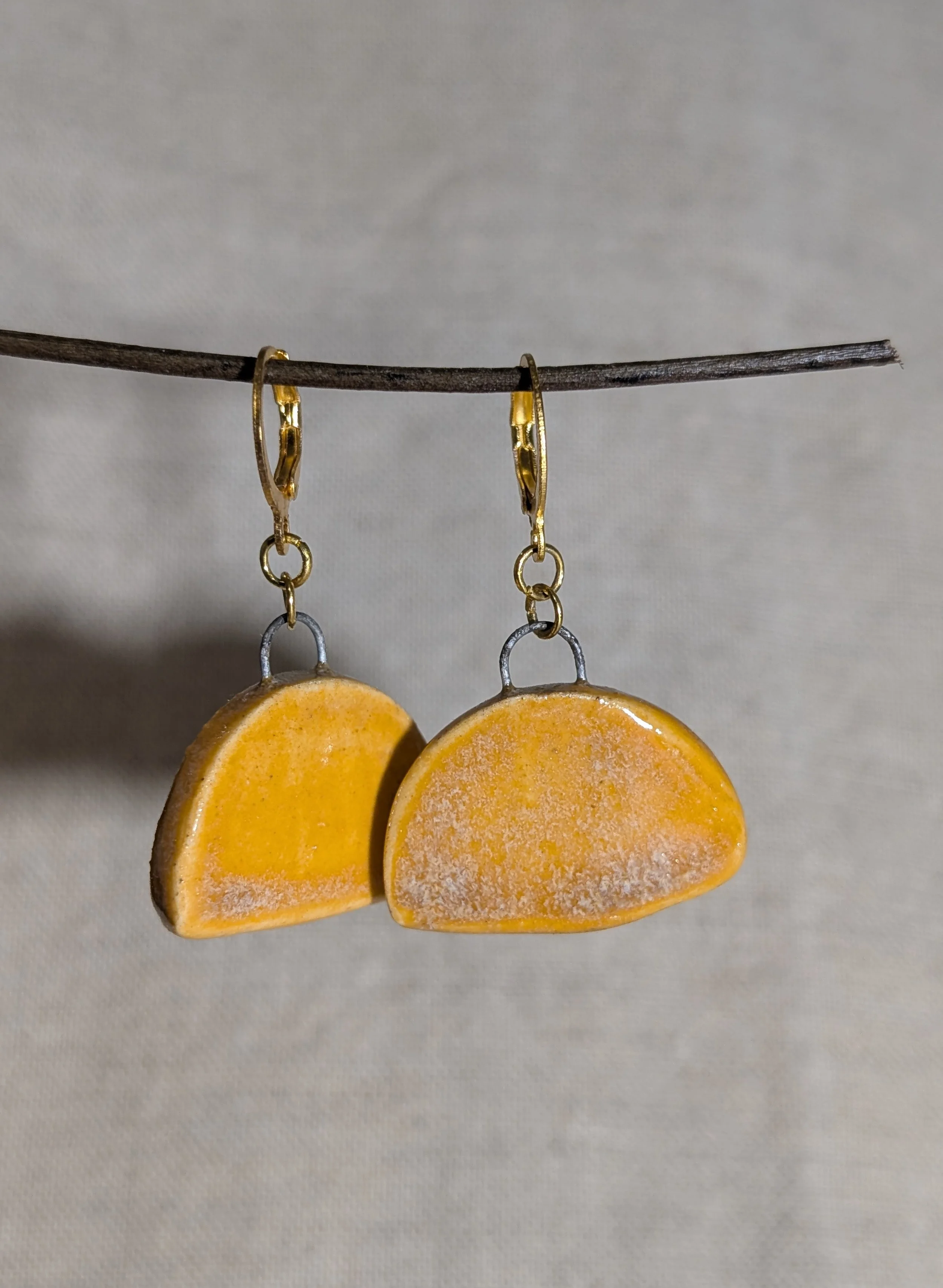 Boucles d'oreilles en demi-cercle