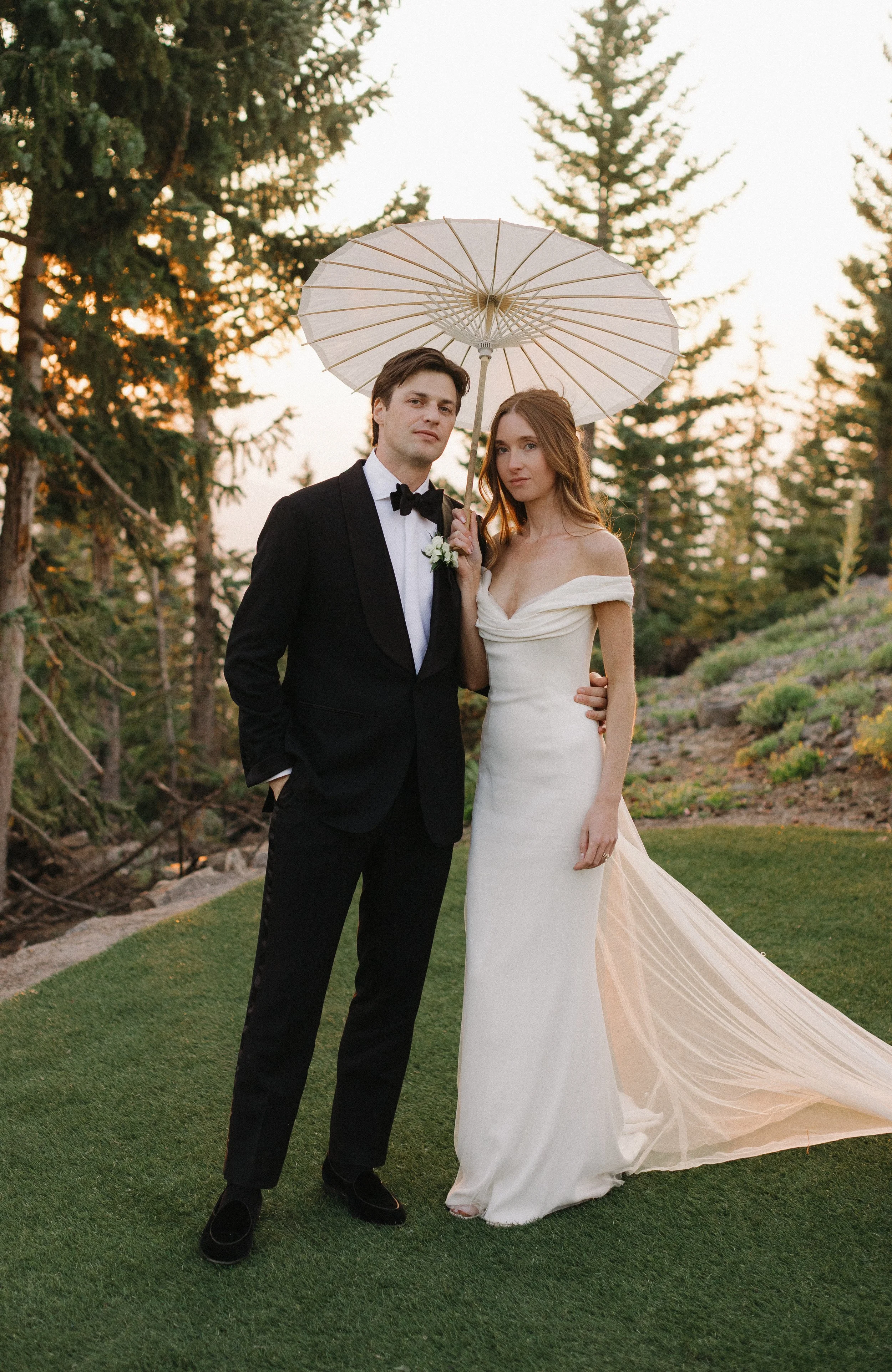 Editorial portrait of a bride and groom in black tie attire at the Little Nell in Aspen.