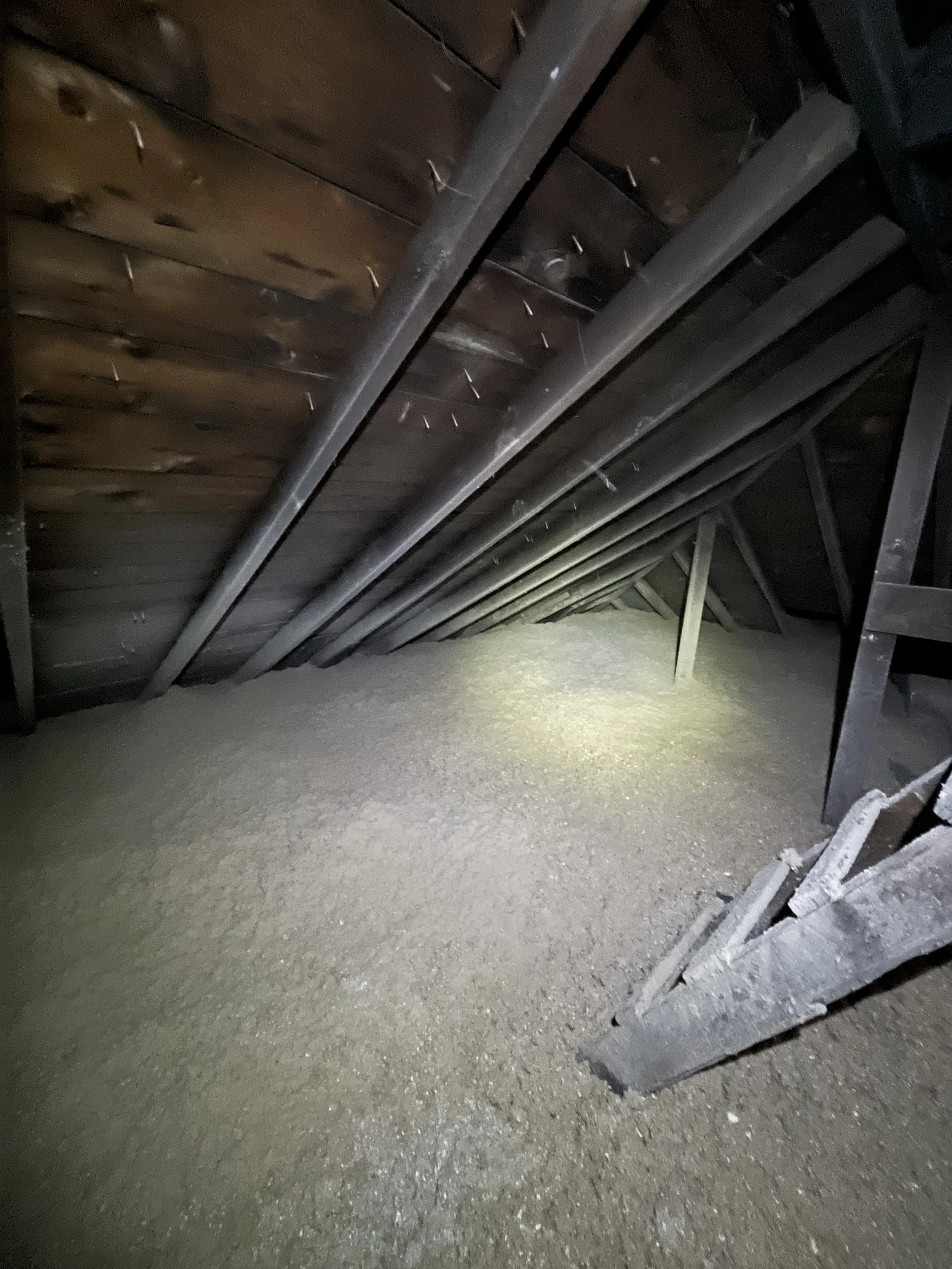 We blew in all new cellulose insulation in the attic, as well as completely insulated the entire building with fiberglass.