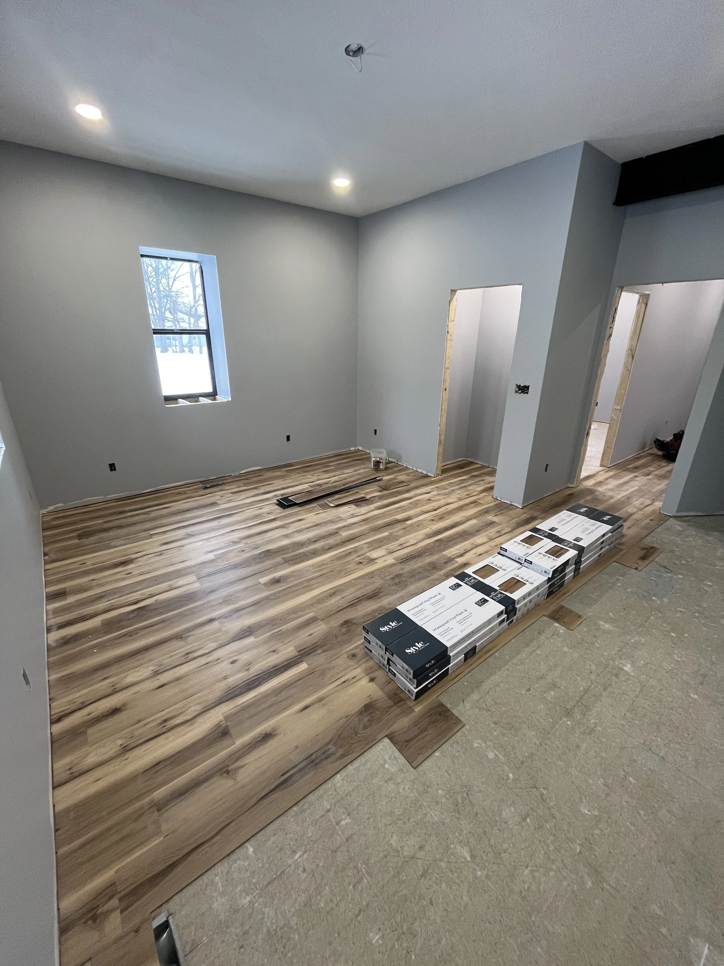 LVP Flooring starting to go in after painting was complete. 