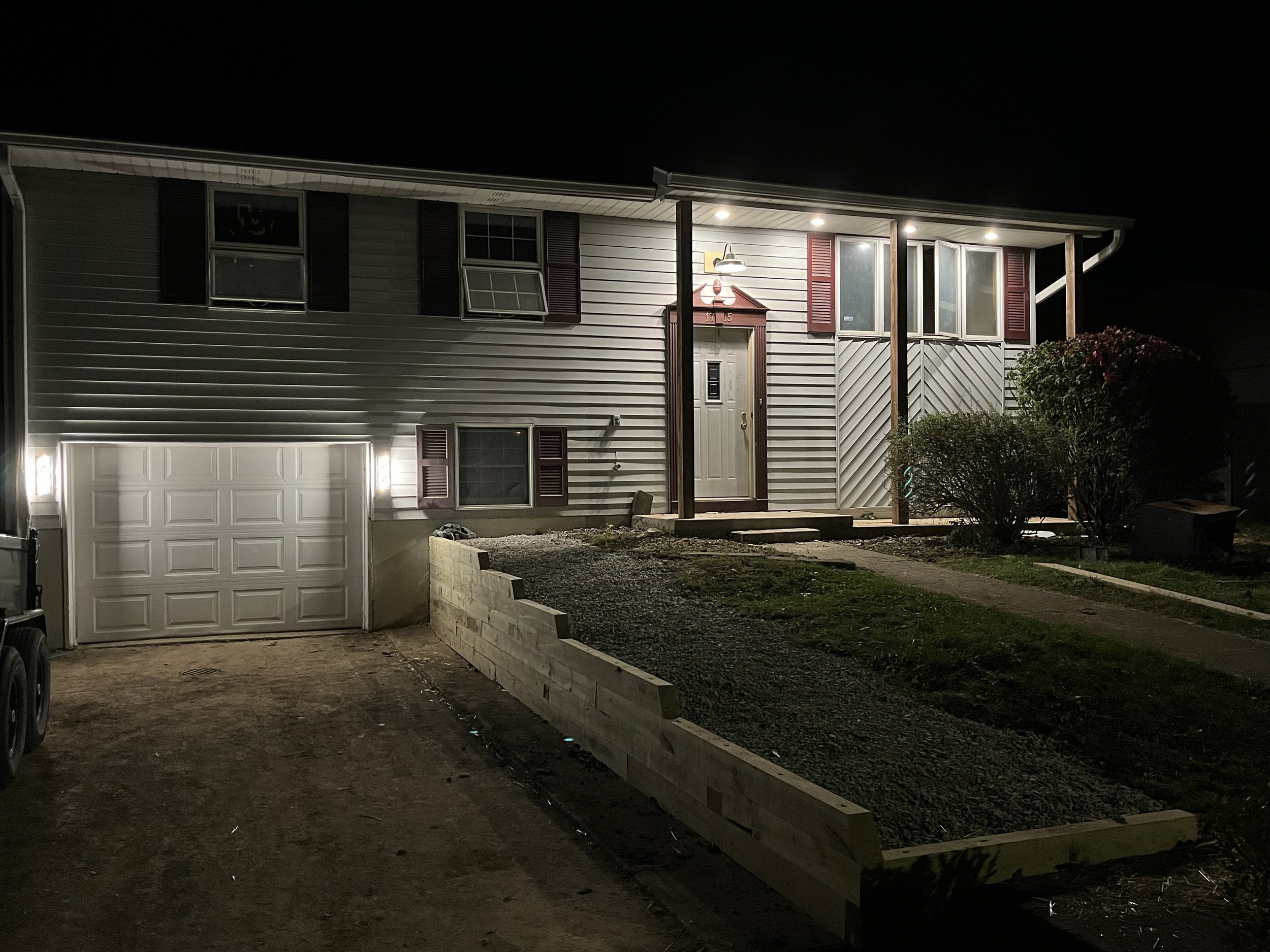 A nice night photograph of the newly wrapped posts and new exterior lights.