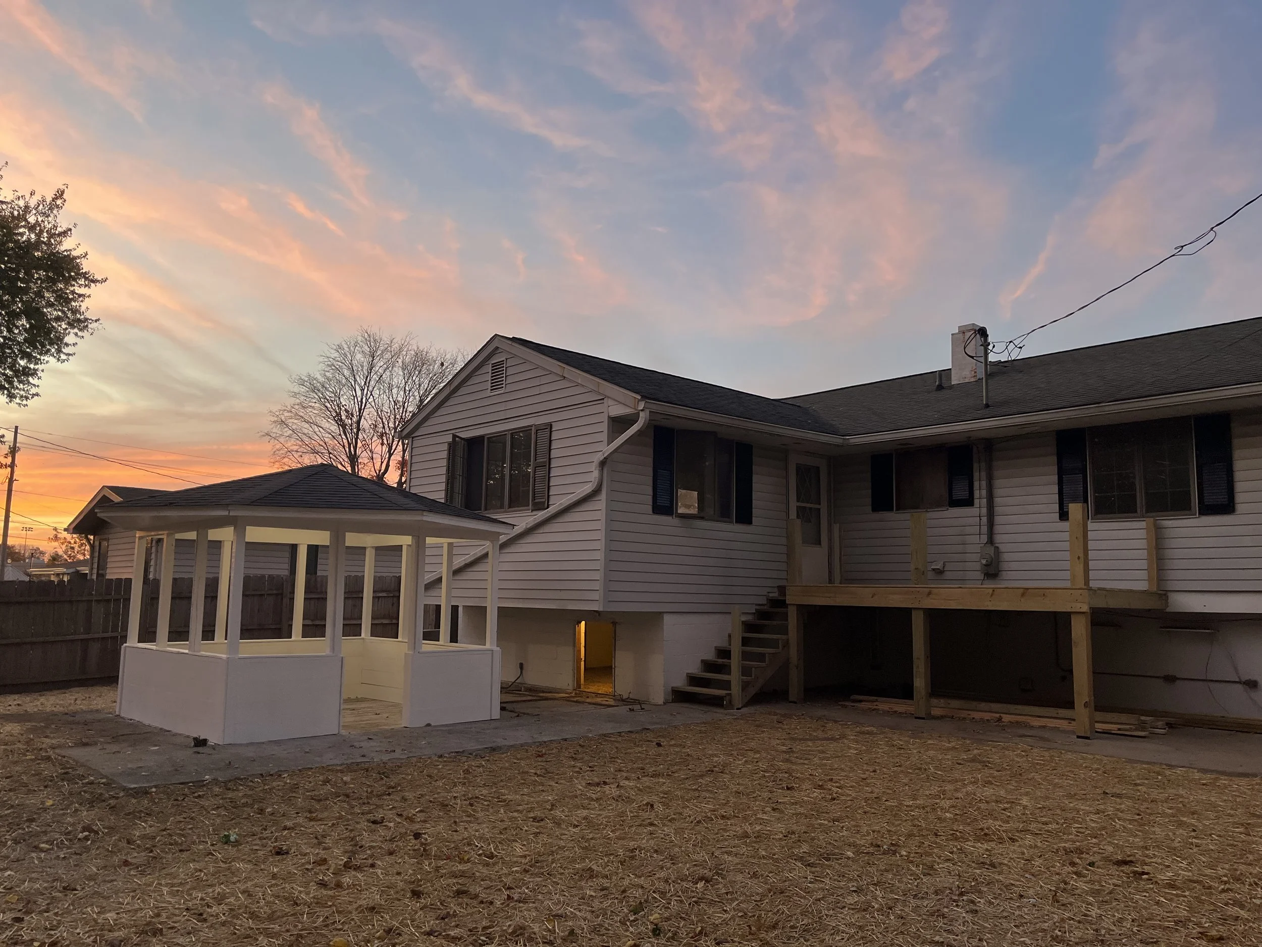Because who doesn't love a nice sunset photograph after a long day at work. (probably took this photo to showcase the gazebo light)