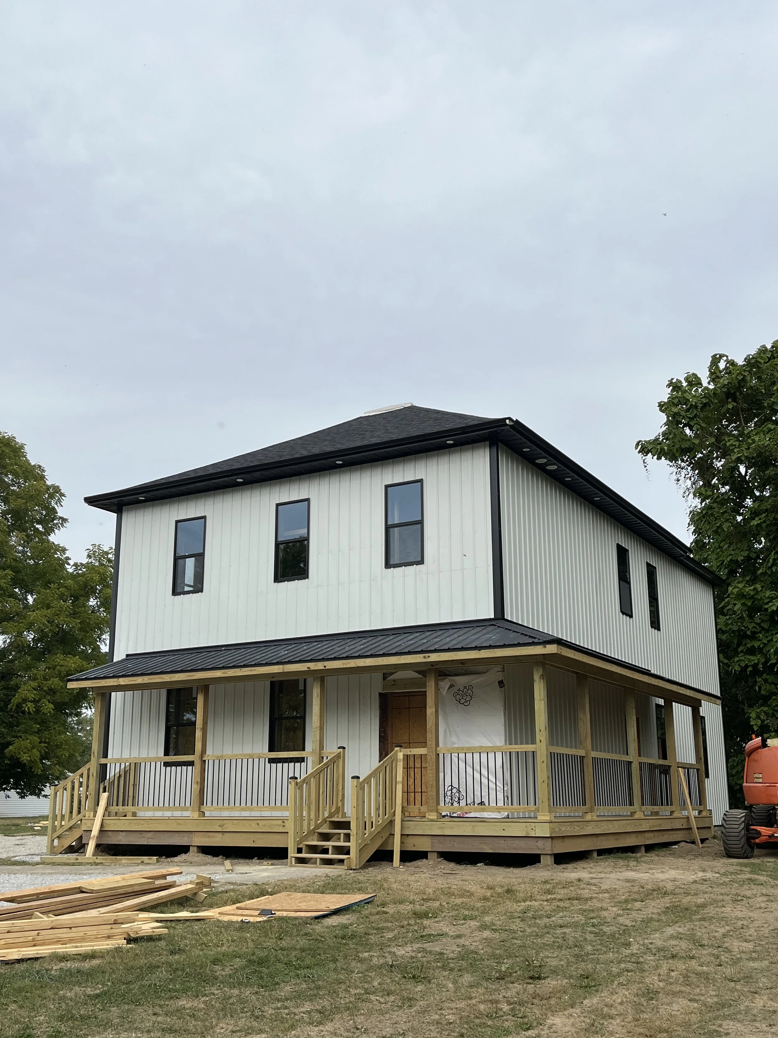 All the windows and metal siding installed.