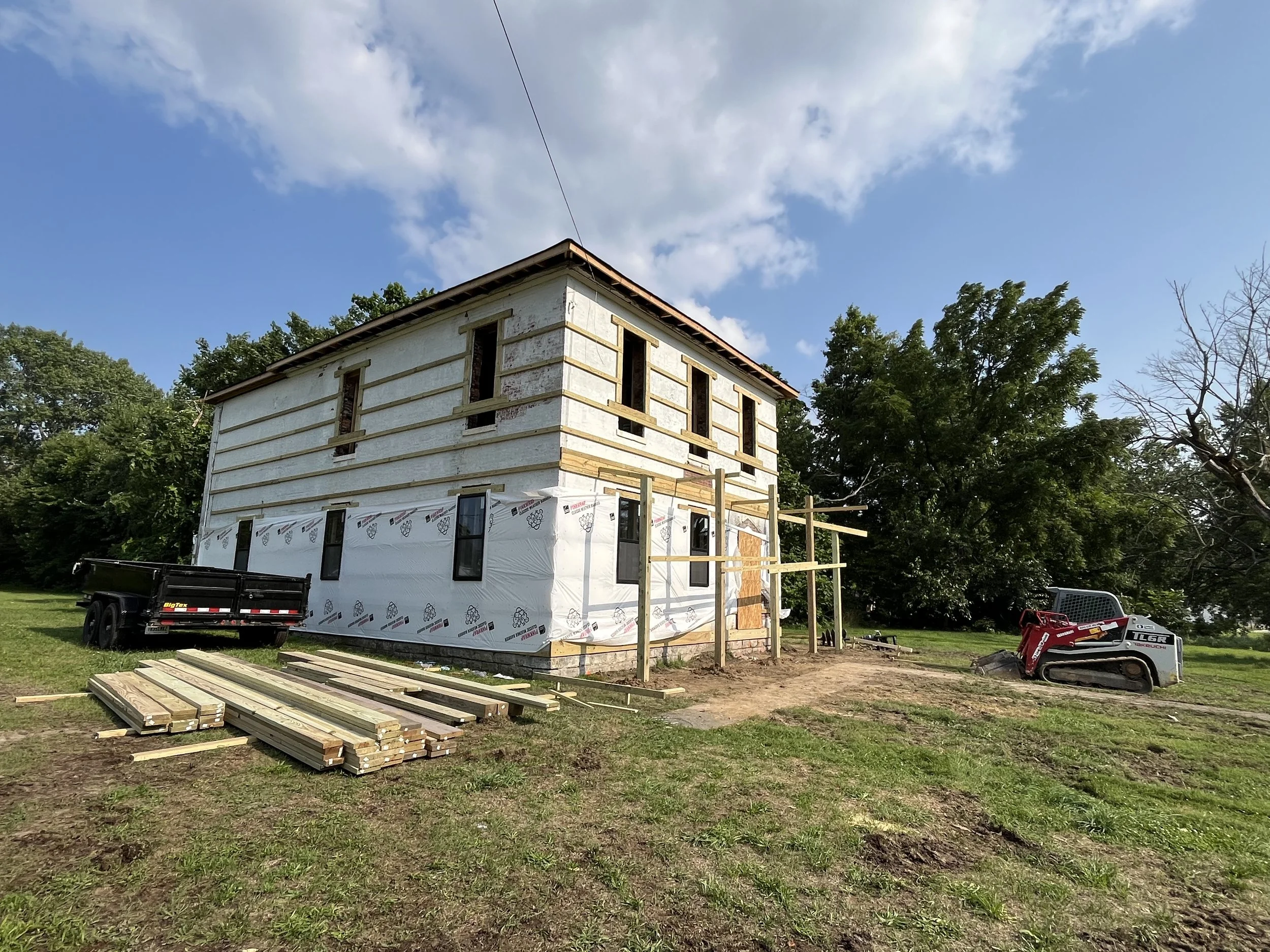 Wrap around porch framing started.