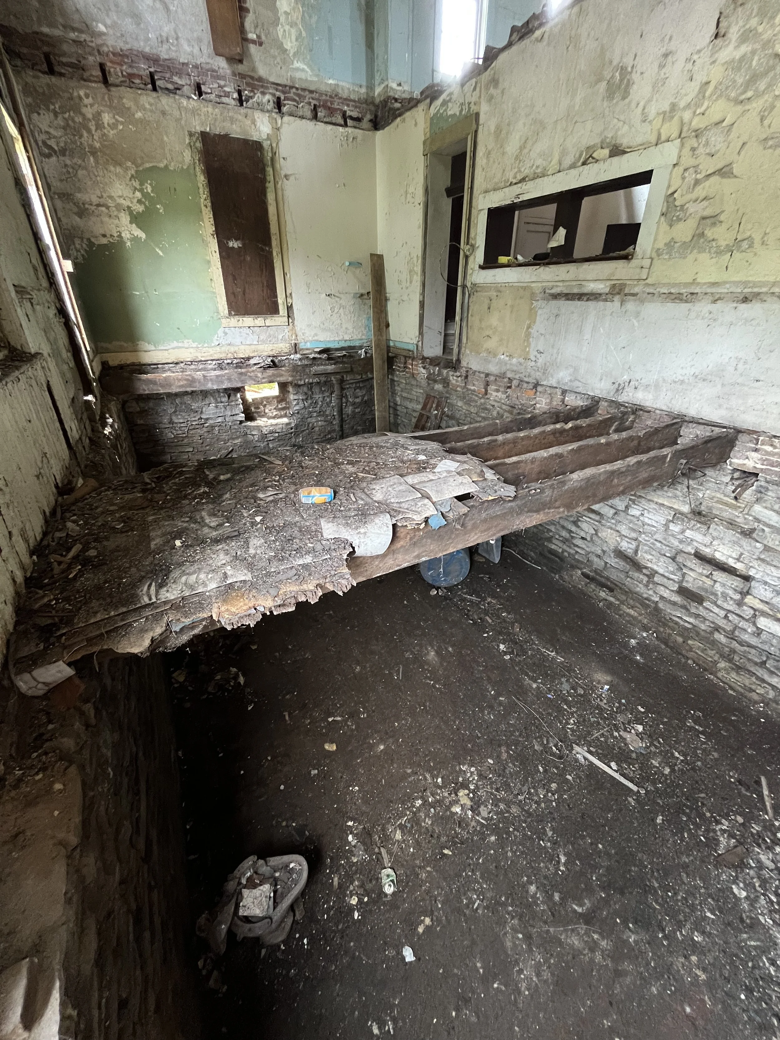 Pictured here is the basement, first floor, and second floor. Not too often you can see all three floors at once.