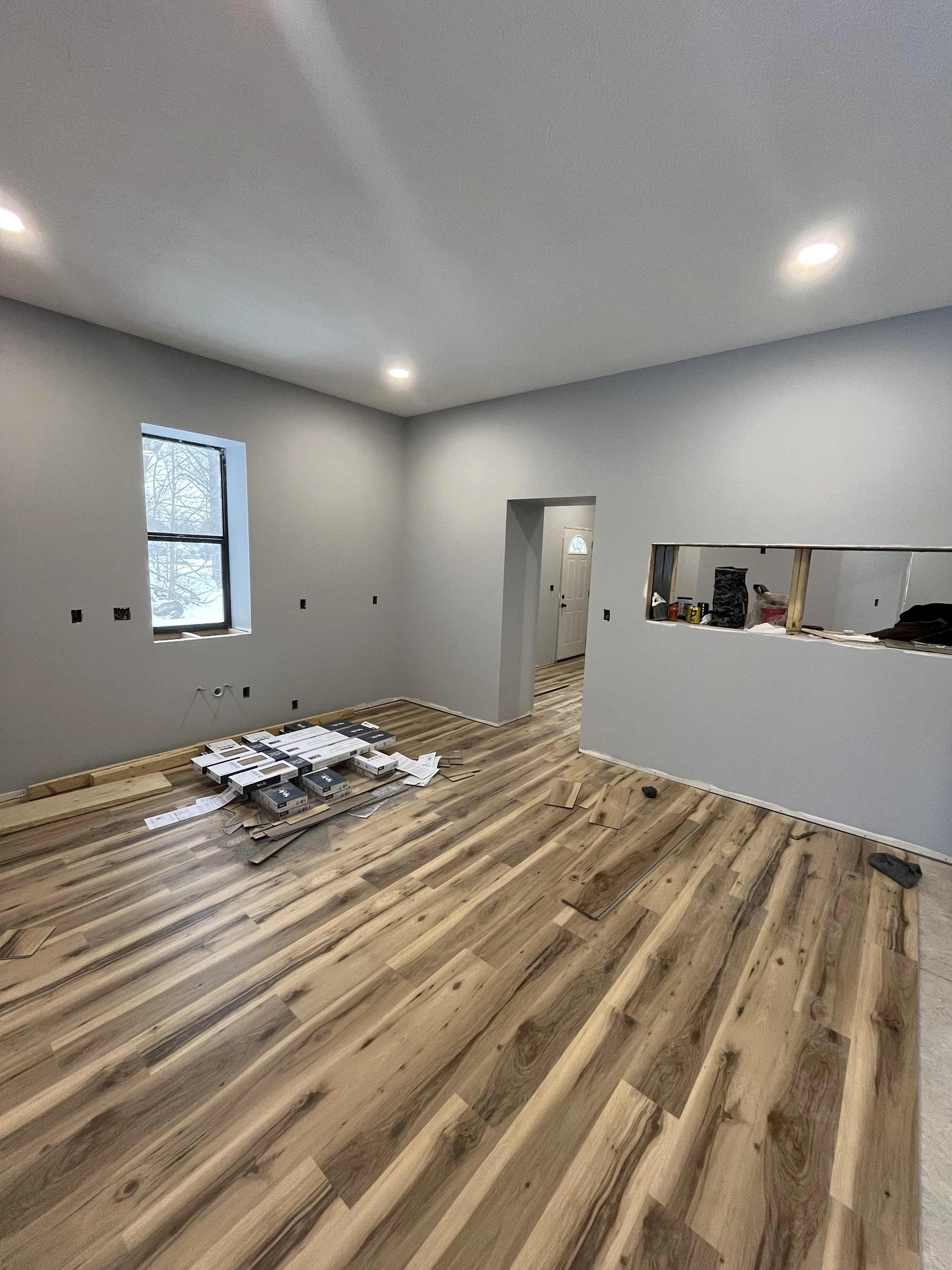 Flooring in the first floor kitchen.

 (You may notice the walls seem extra deep, they are roughly 2ft thick because of the original brickwork.)