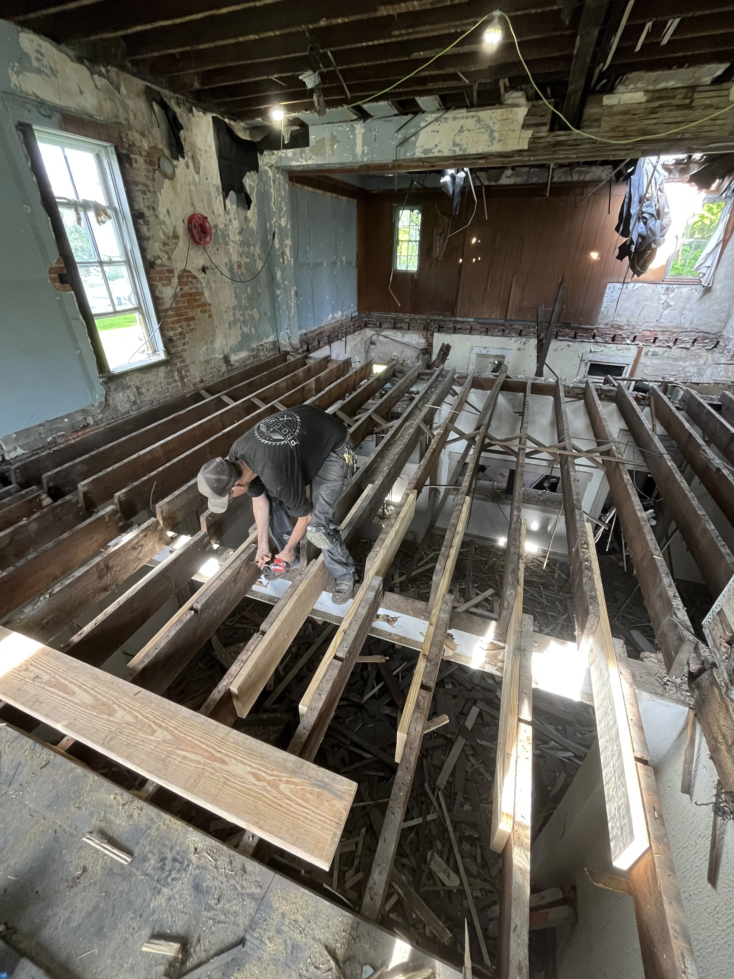 Second floor, floor joists getting spliced in by Micah Thompson (Co-Founder)
