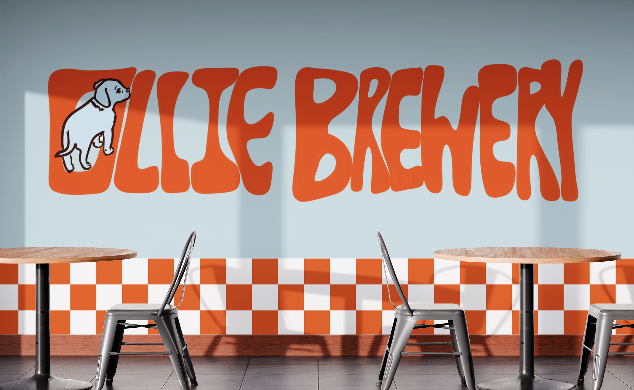 Fast food restaurant interior with a bright orange and white checkered wall, tabletop with four chairs, and a large wall sign displaying an illustration of a dog and the words "Lickety Split" in bold orange font.