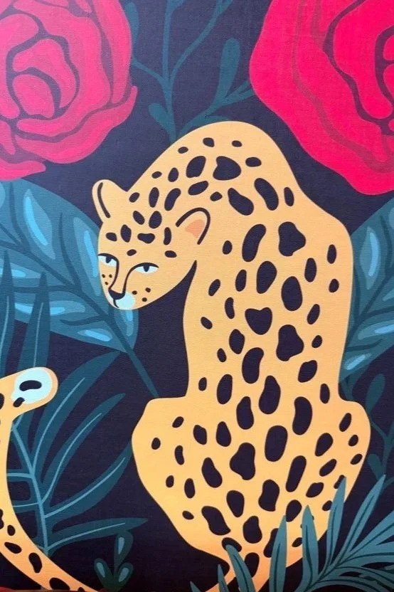Colorful illustration of a cheetah with a yellow coat and black spots, surrounded by lush green foliage and large pink flowers.