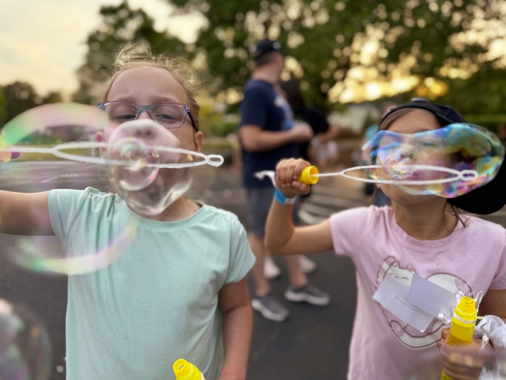 Kids blowing bubbles