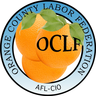 Oranges with green leaves inside a circular logo for the Orange County Labor Federation, AFL-CIO.