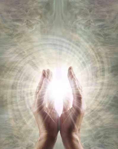 Two hands raised towards a bright glowing light surrounded by rippling concentric circles, with a cloudy sky in the background.