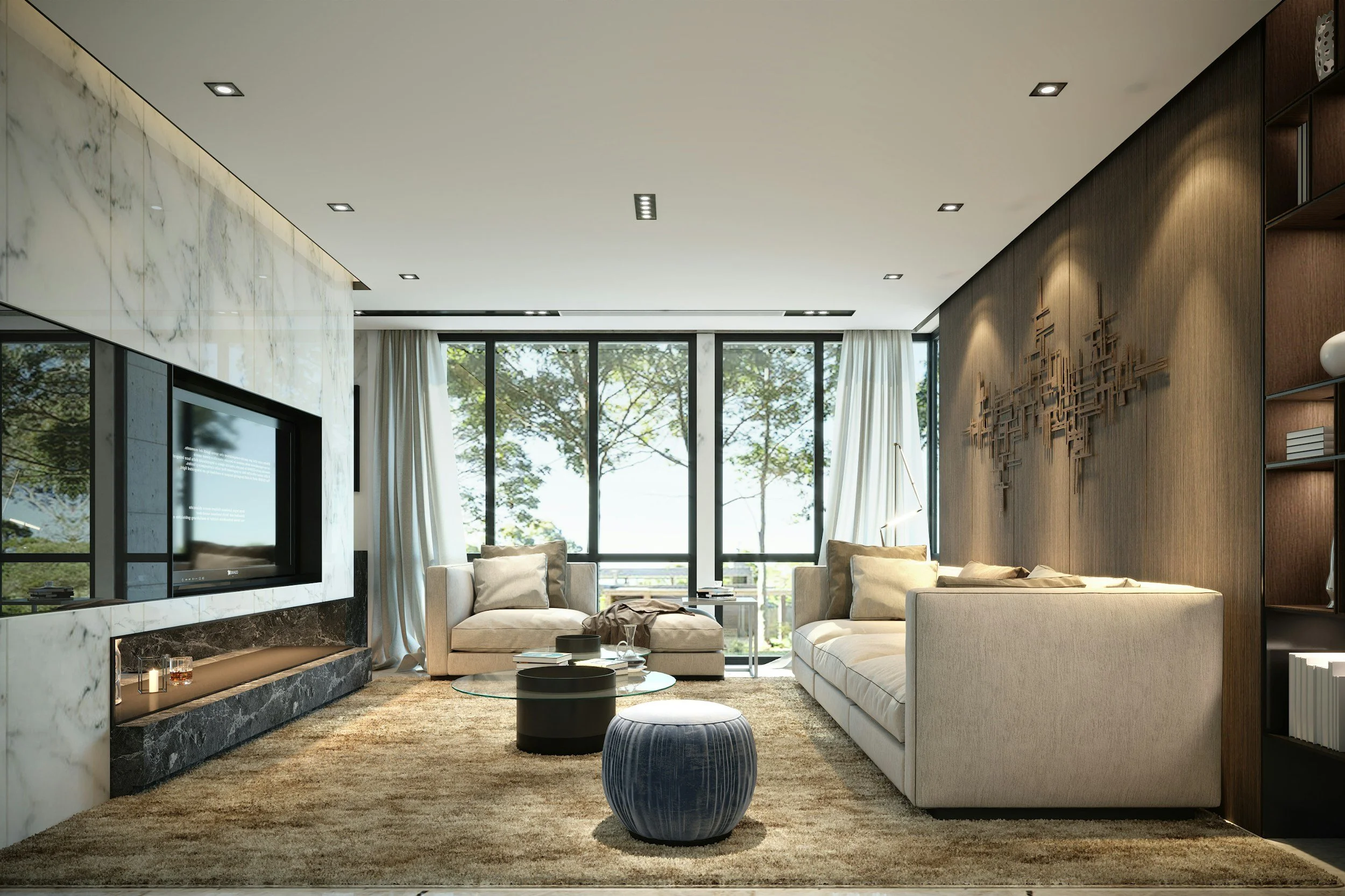 Modern living room with a beige sofa, round side tables, a textured rug, large windows with curtains, and a wall-mounted flat screen TV with marble and wood paneling.