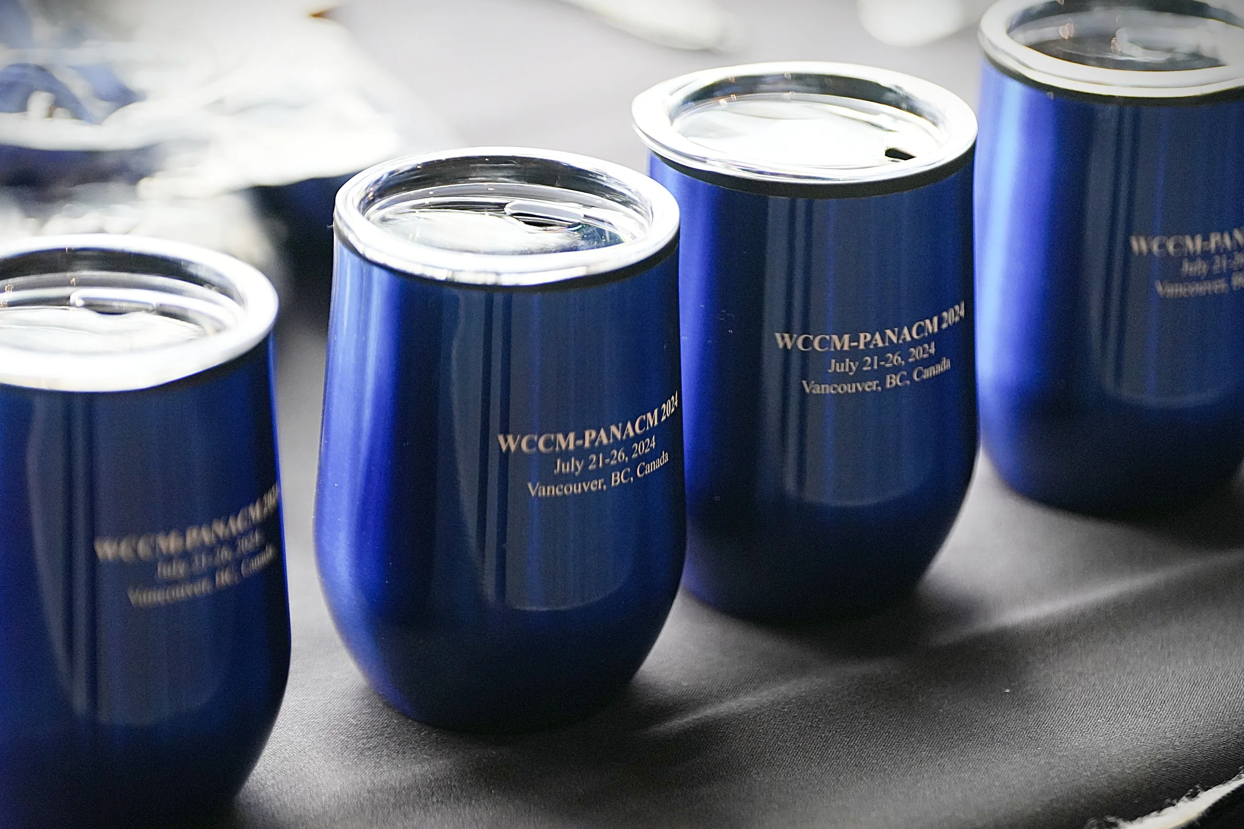 Conference swag mugs.