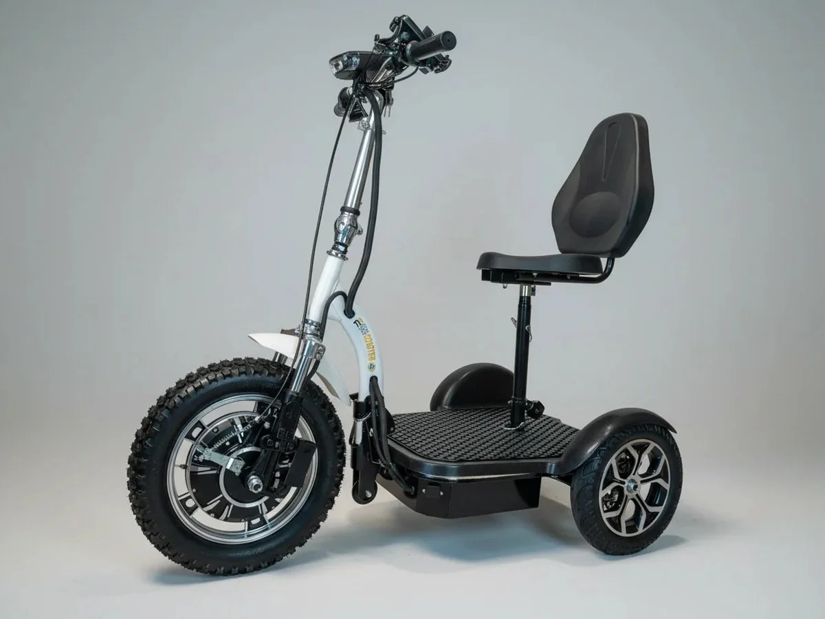 Electric mobility scooter with a black seat, large front wheel, and two smaller rear wheels, set against a plain gray background.