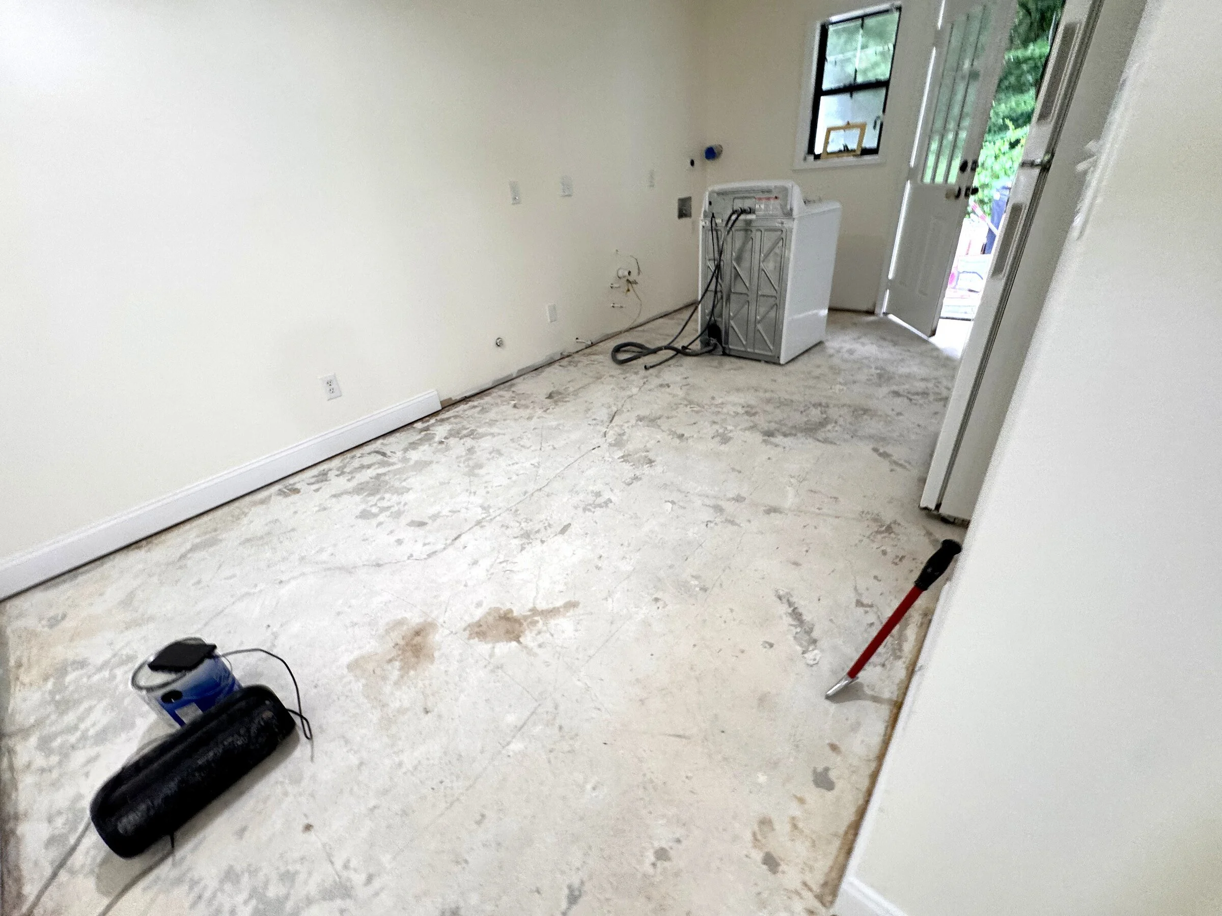Floor surface cleaning and preparation for a residential installation