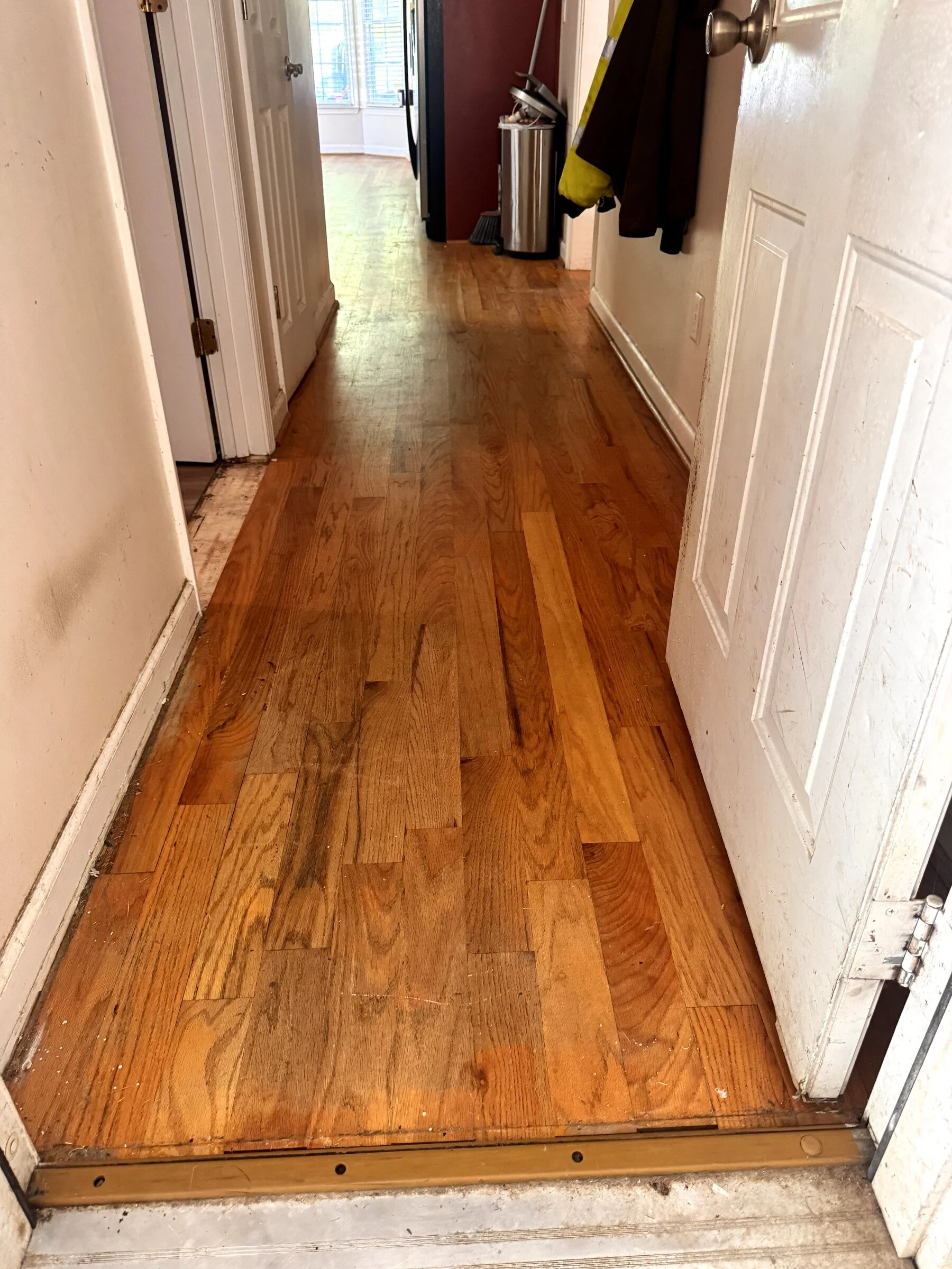 Residential hallway before new flooring installation