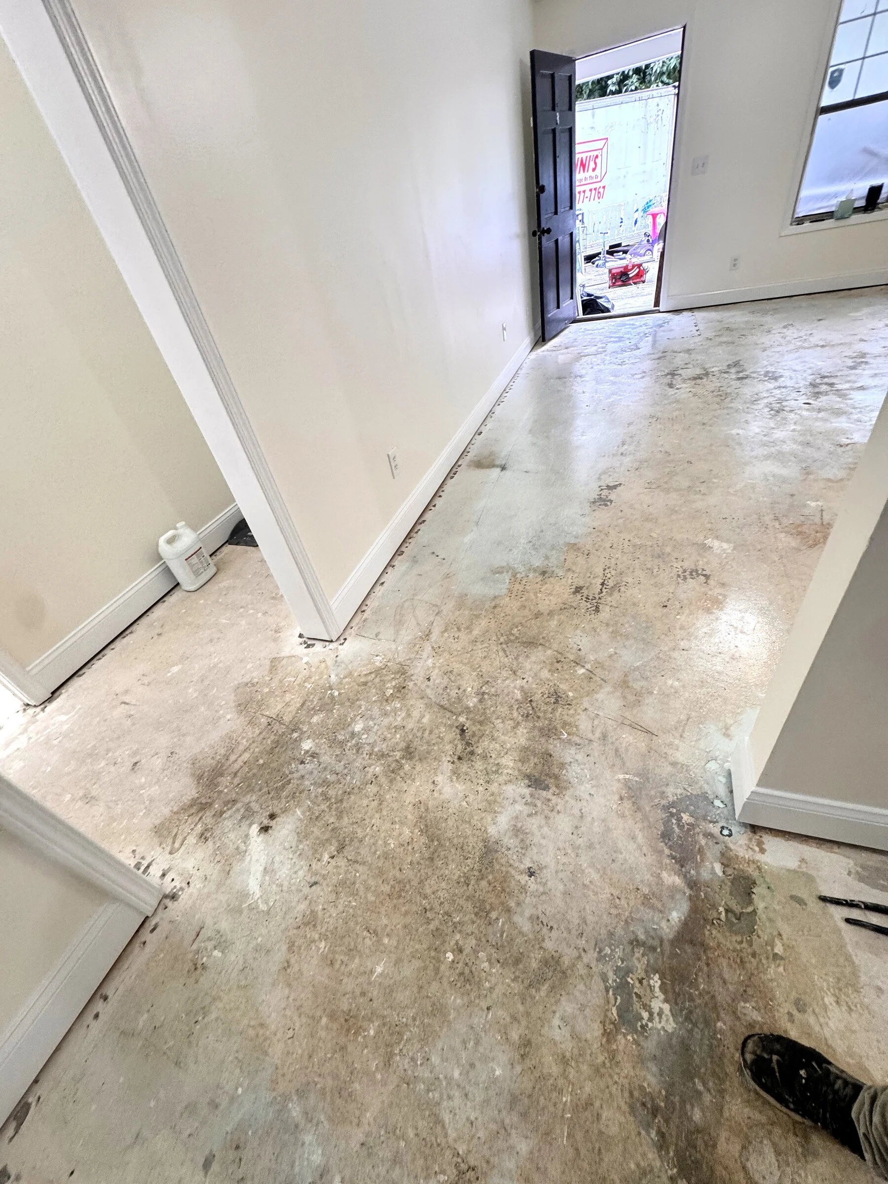 Bare concrete subfloor prepared for a new flooring installation in an Atlanta-area home