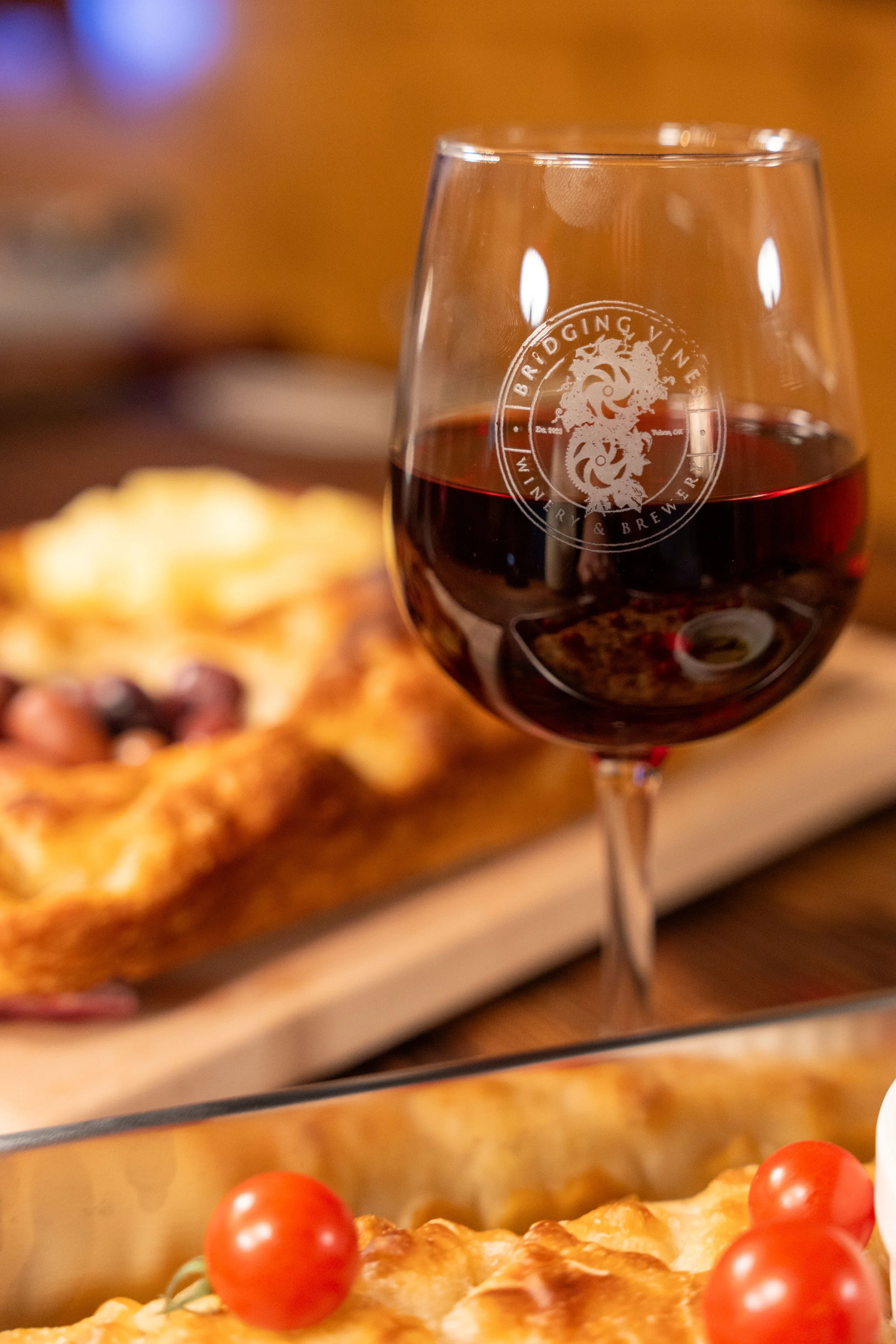Bridging Vines Winery wine glass and focaccia sourdough