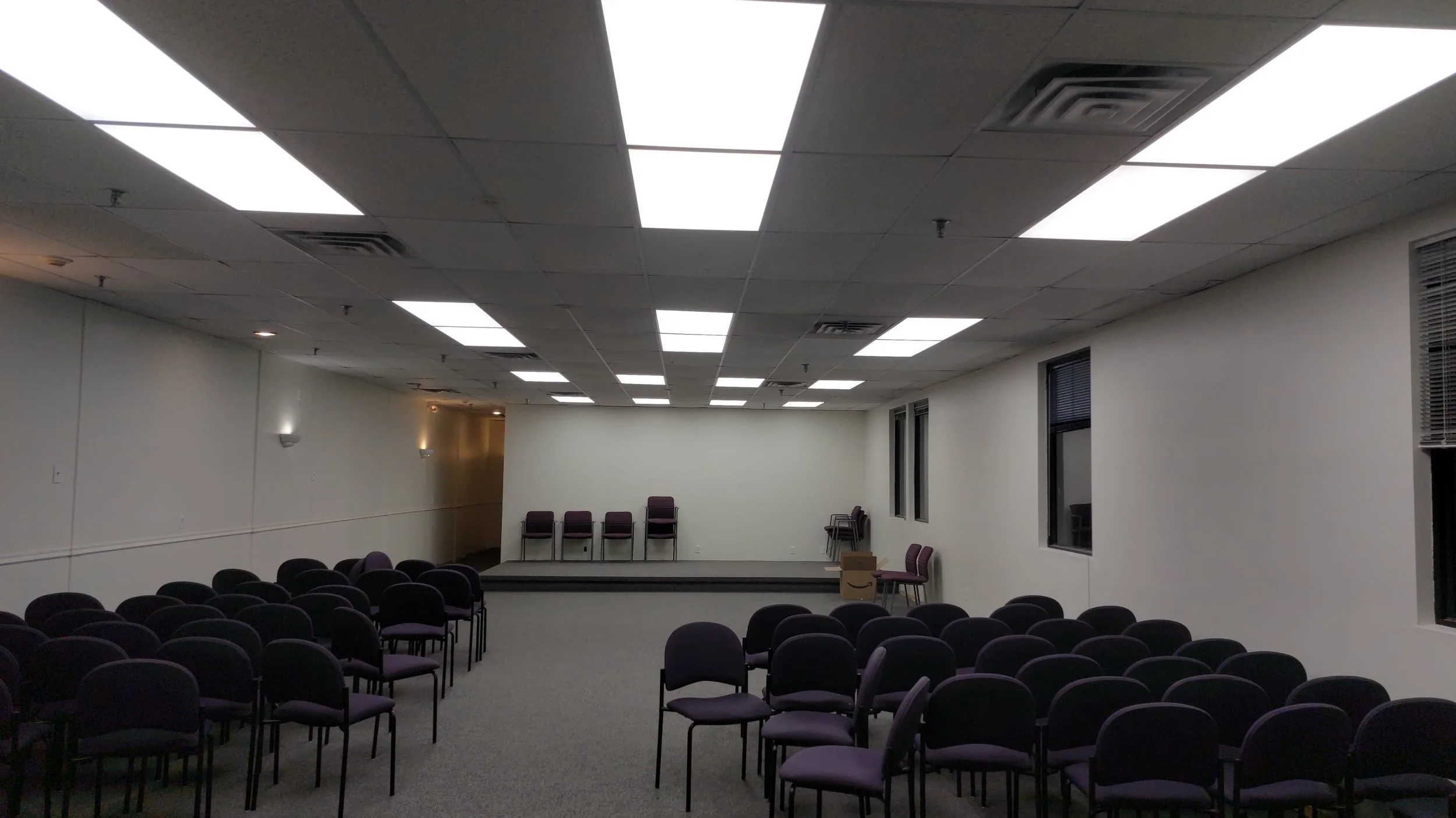 Commercial electrical lighting installation with LED ceiling fixtures completed by M&J Electrical Contractors.