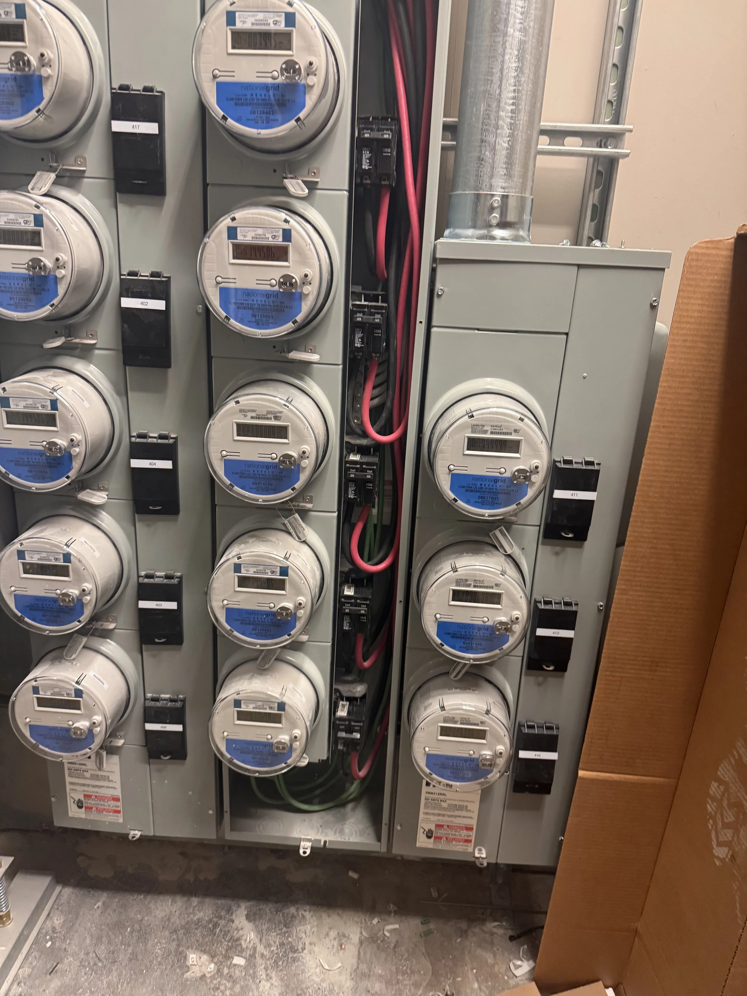 Multifamily electrical meter bank and service equipment installation by M&J Electrical Contractors.