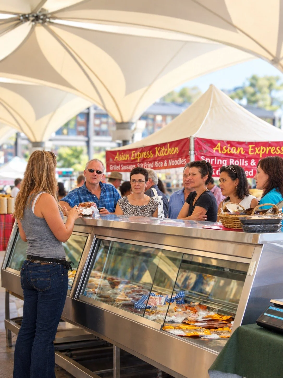 sydney fresh market tour group engaged in vendor's presentation