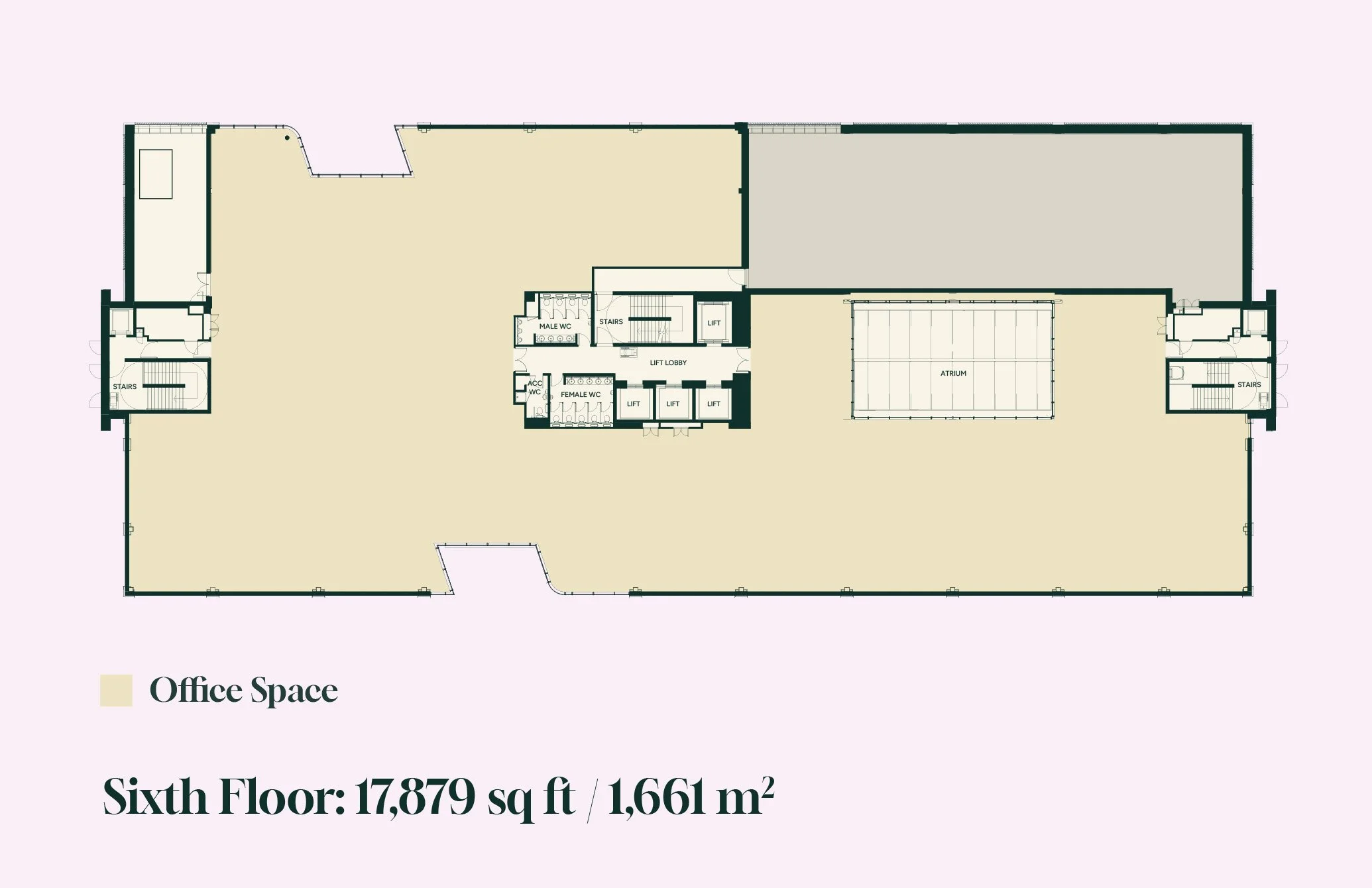 Floor plan of a building's sixth floor showing office spaces, restrooms, staircases, elevators, and an atrium.