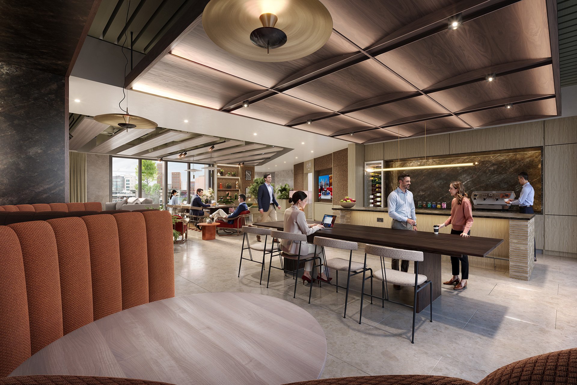 Indoor lounge area with people sitting and chatting, a barista behind the counter, modern decor, large windows with city view, warm lighting, and stylish furniture.
