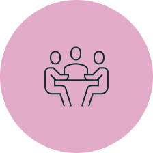 Outline of three people sitting around a table inside a pink circle.