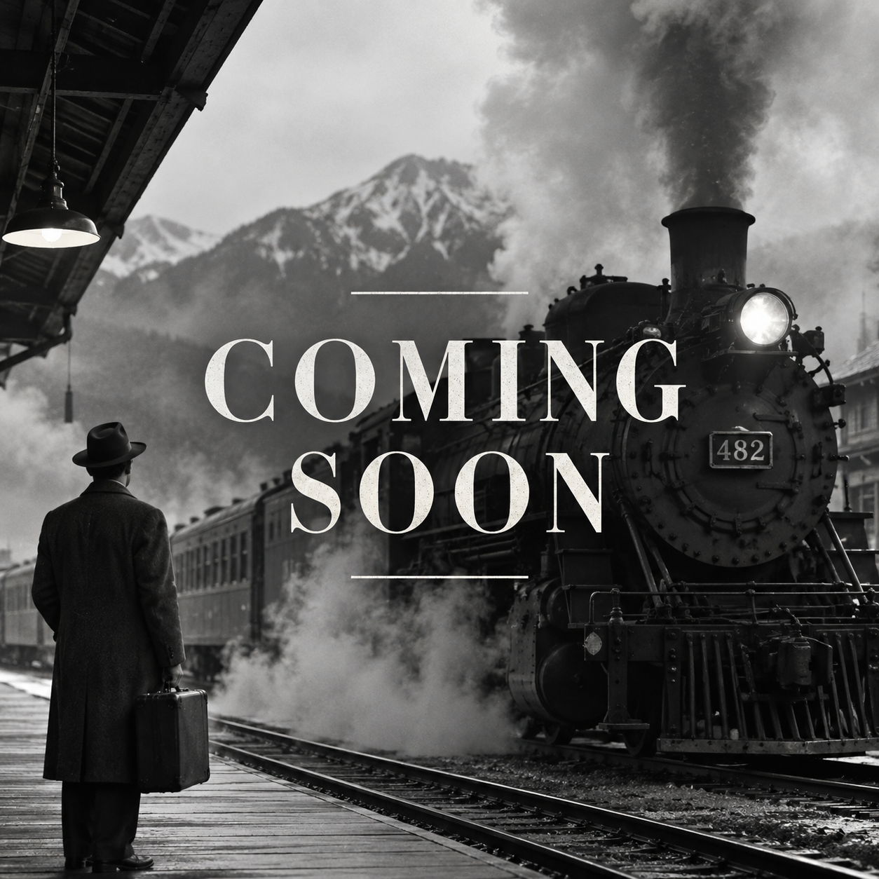 Black and white image of a train station with a steam locomotive at the platform, a man in a coat and hat waiting with a suitcase, and mountains in the background. The text 'Coming Soon' is overlaid on the image.