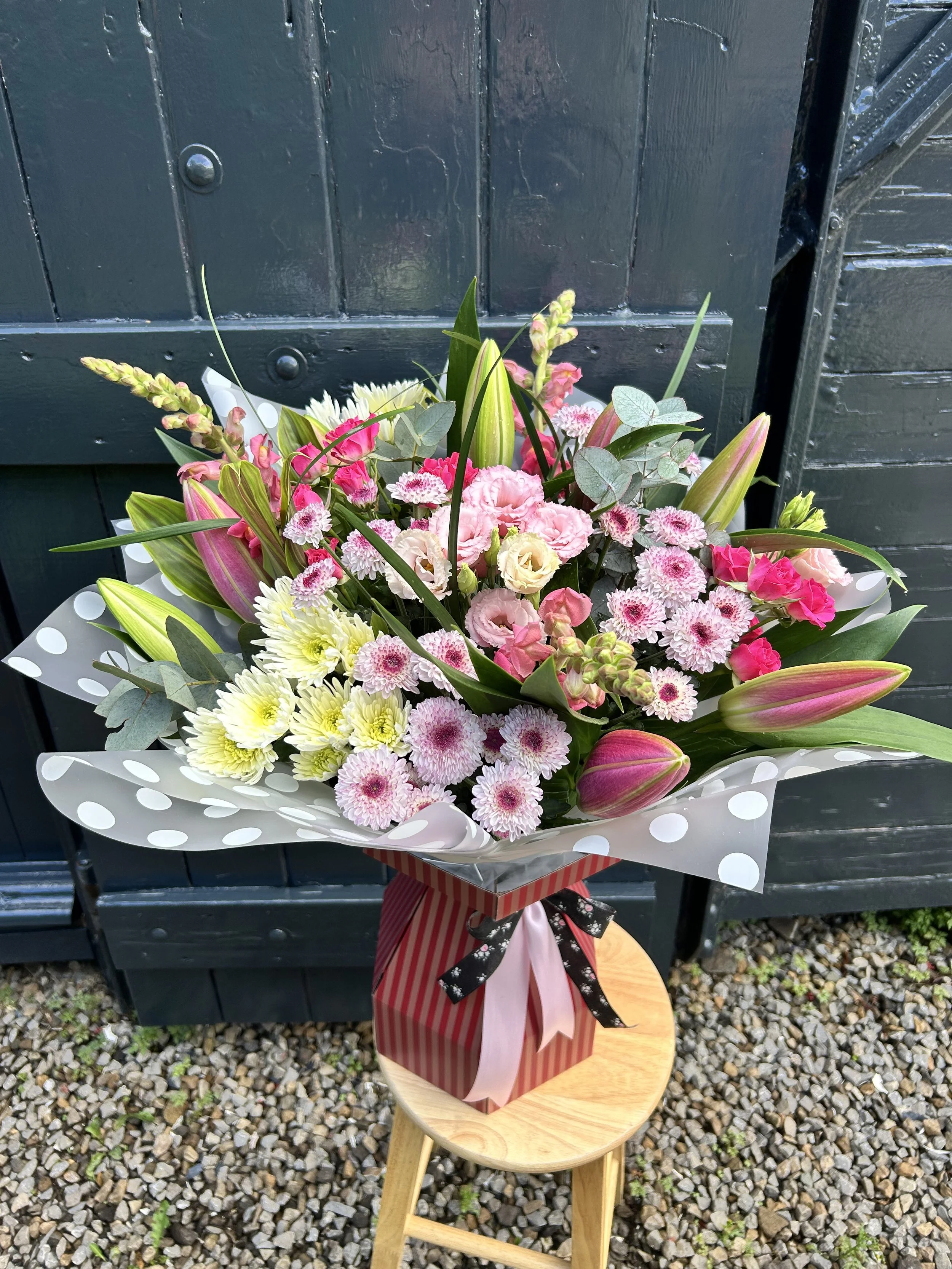 A colourful bouquet of flowers made by Annie's Flower Shed.