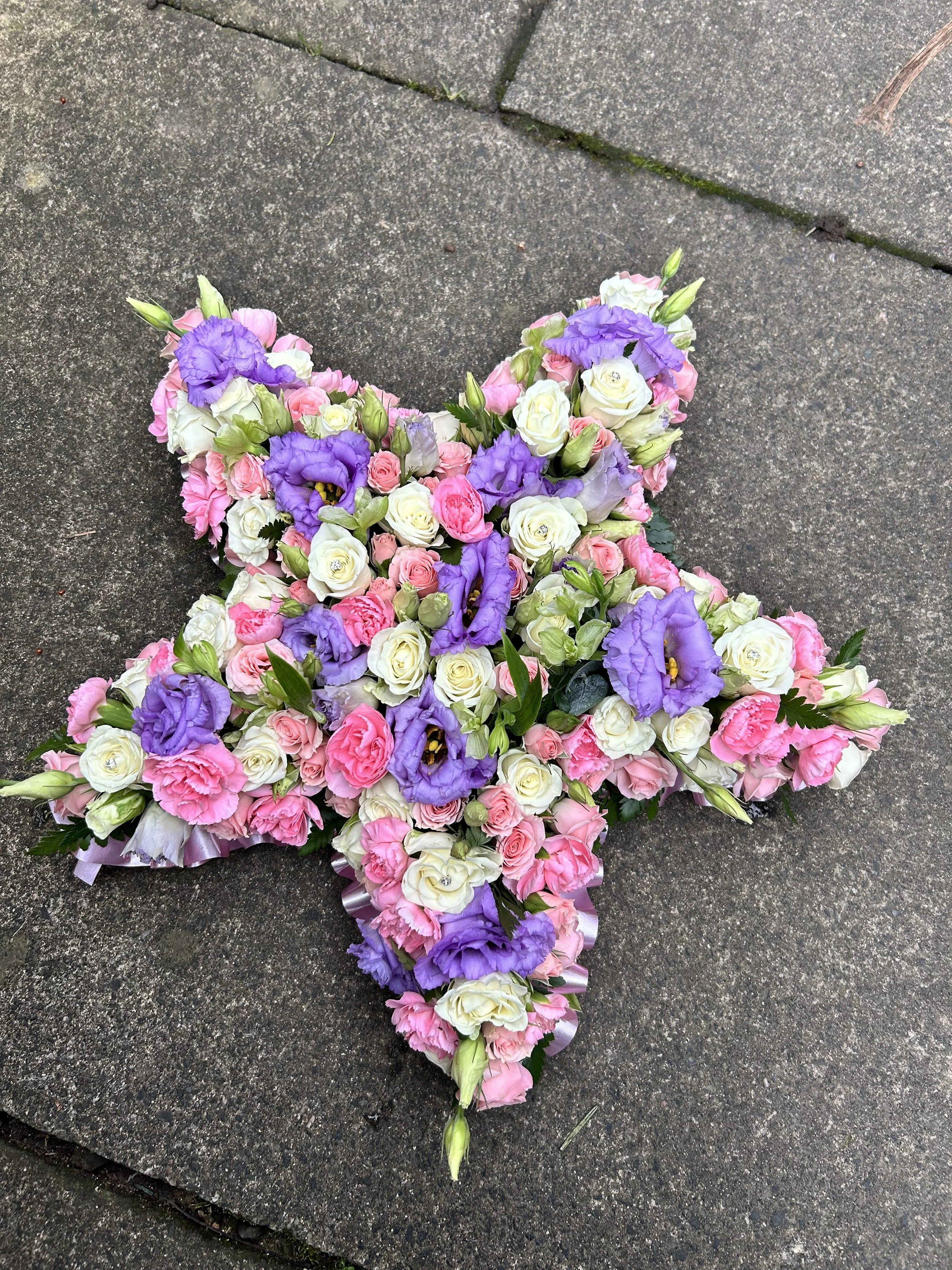 A bespoke floral arrangement made by Annie's Flower Shed.