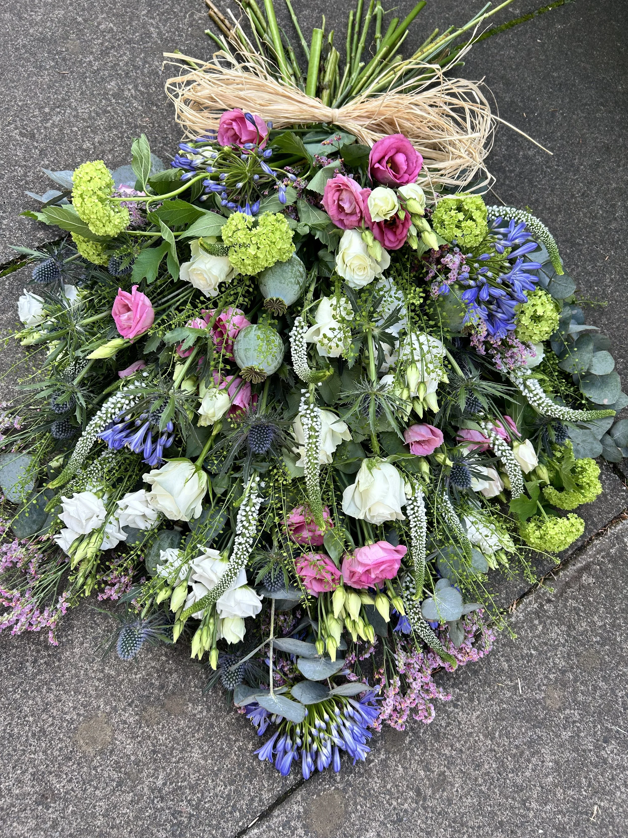 A large funeral hand-tied sheaf