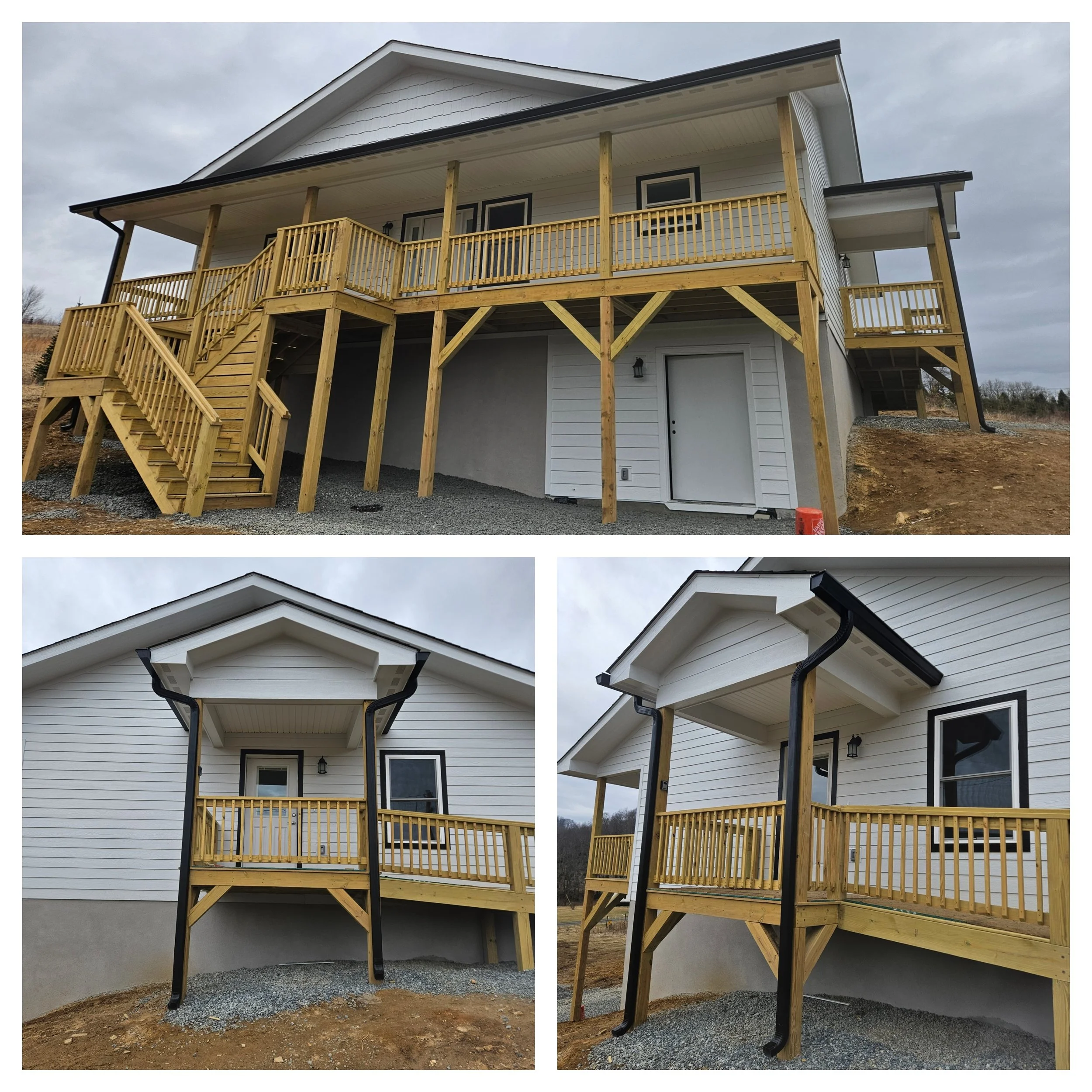 Progress of a residential deck construction showing a multi-level wooden deck with stairs and railing attached to a white house with dark trim. The deck is elevated with support beams underneath, and the area around the house is cleared and uneven.