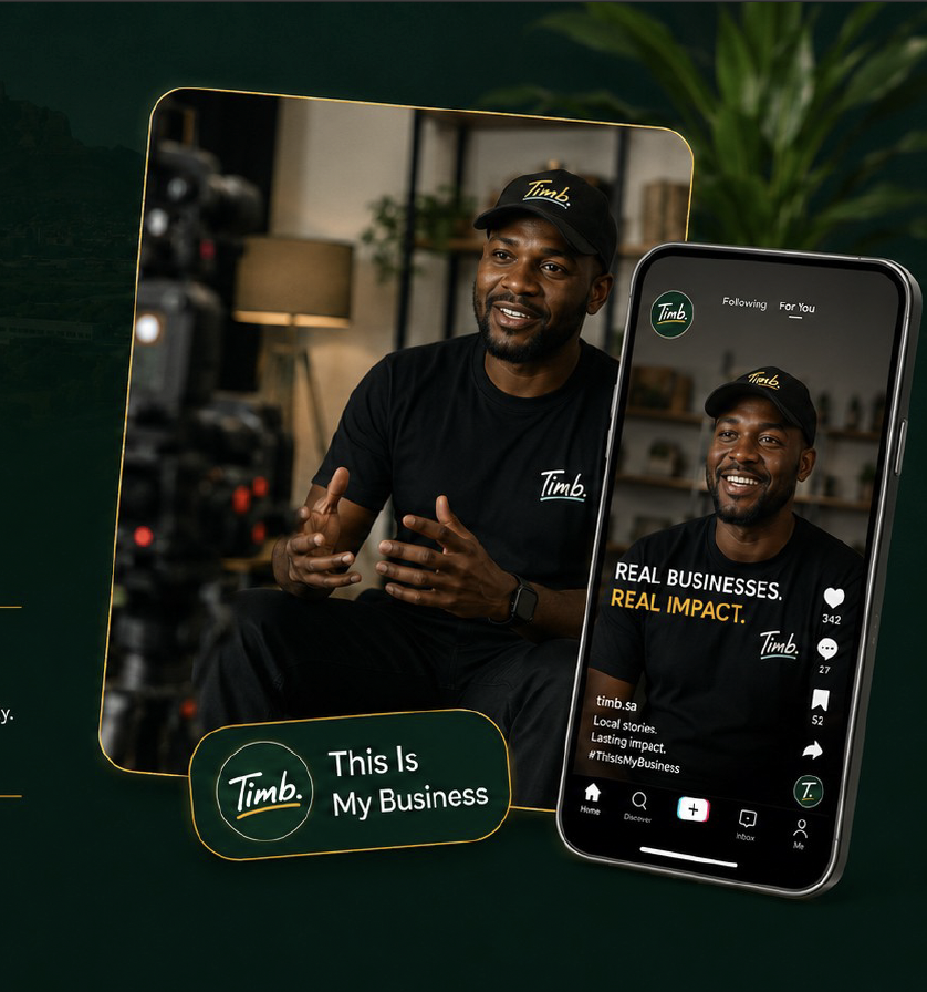 A man in a black shirt and cap with 'Timb' logo, sitting indoors, talking in a video interview, with a smartphone displaying the same man in a TikTok video promoting 'Timb' as a real business that makes an impact.