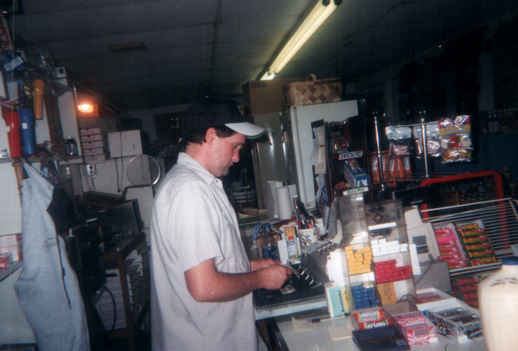 Randy Turner working the register at Turner's Grocery 1999