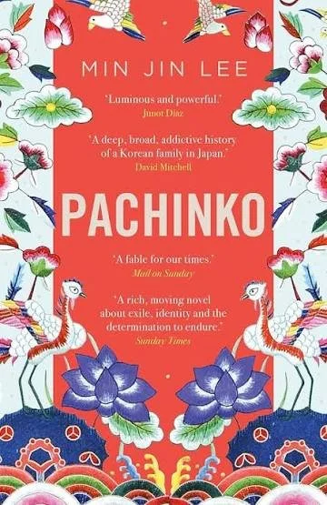 Book cover: a red rectangle fills the centre, housing the book title in bold lettering and review snippets. Down either side are traditional Korean designs for flowers and birds as might be found on silk clothes.