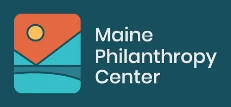 Logo of Maine Philanthropy Center with stylized graphic of a sun, mountain, and water