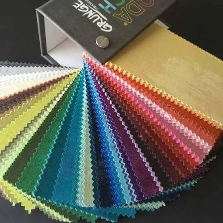 A fan of colorful fabric swatches arranged in a gradient pattern.