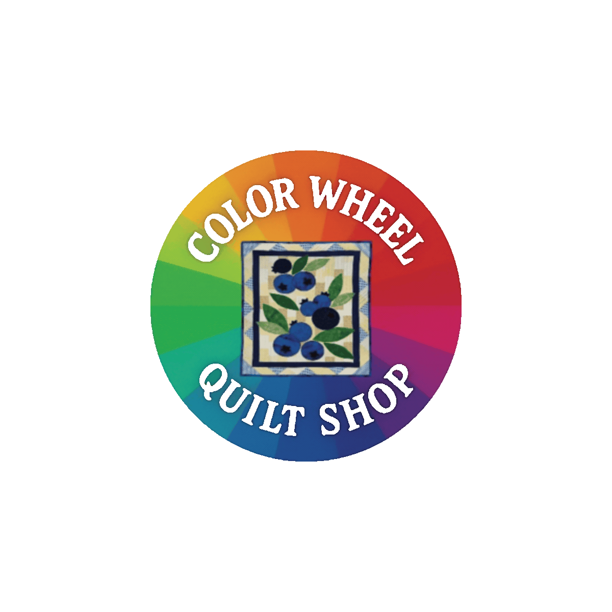 Color wheel with sections in rainbow colors and the text 'Color Wheel Quilt Shop' around it, featuring a central design of blueberries and green leaves.