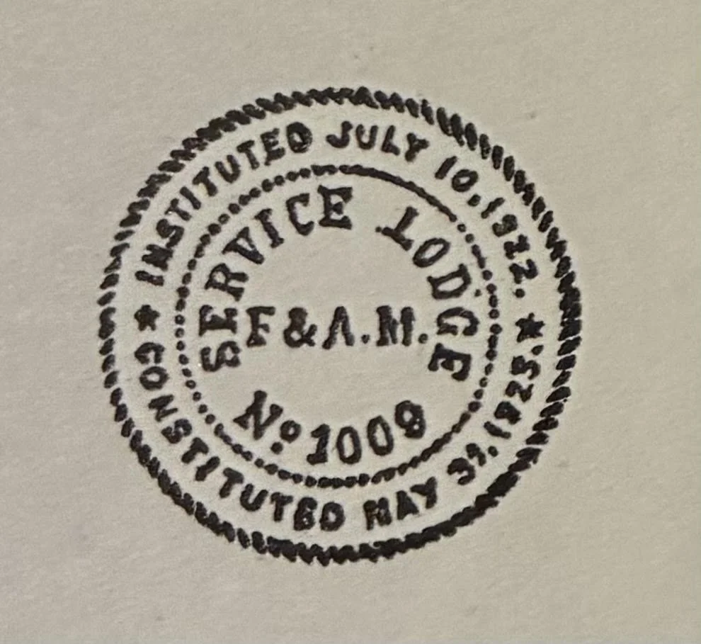 an image of the official seal of Service Lodge No.1009