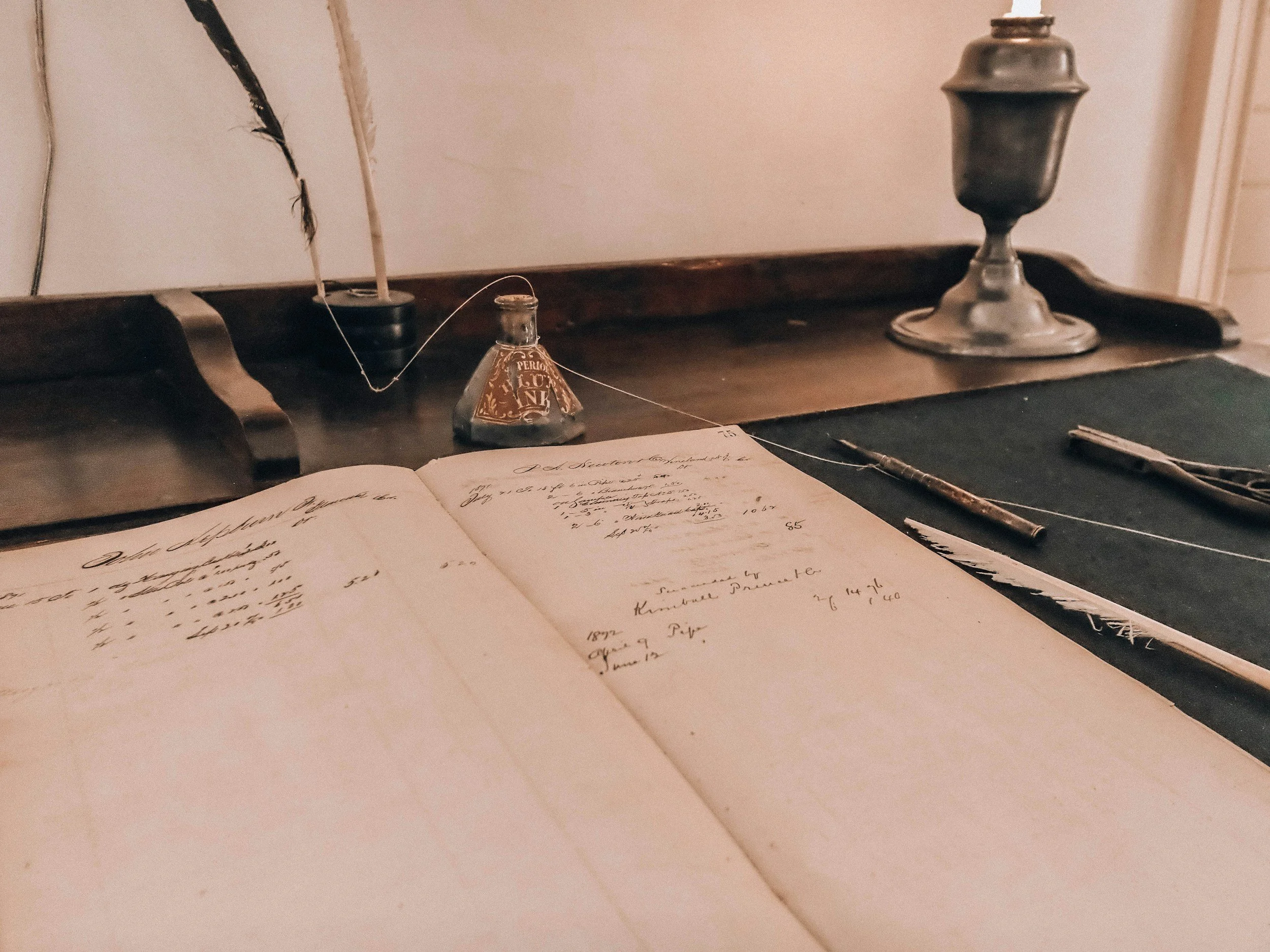image of an old office with quill and journal