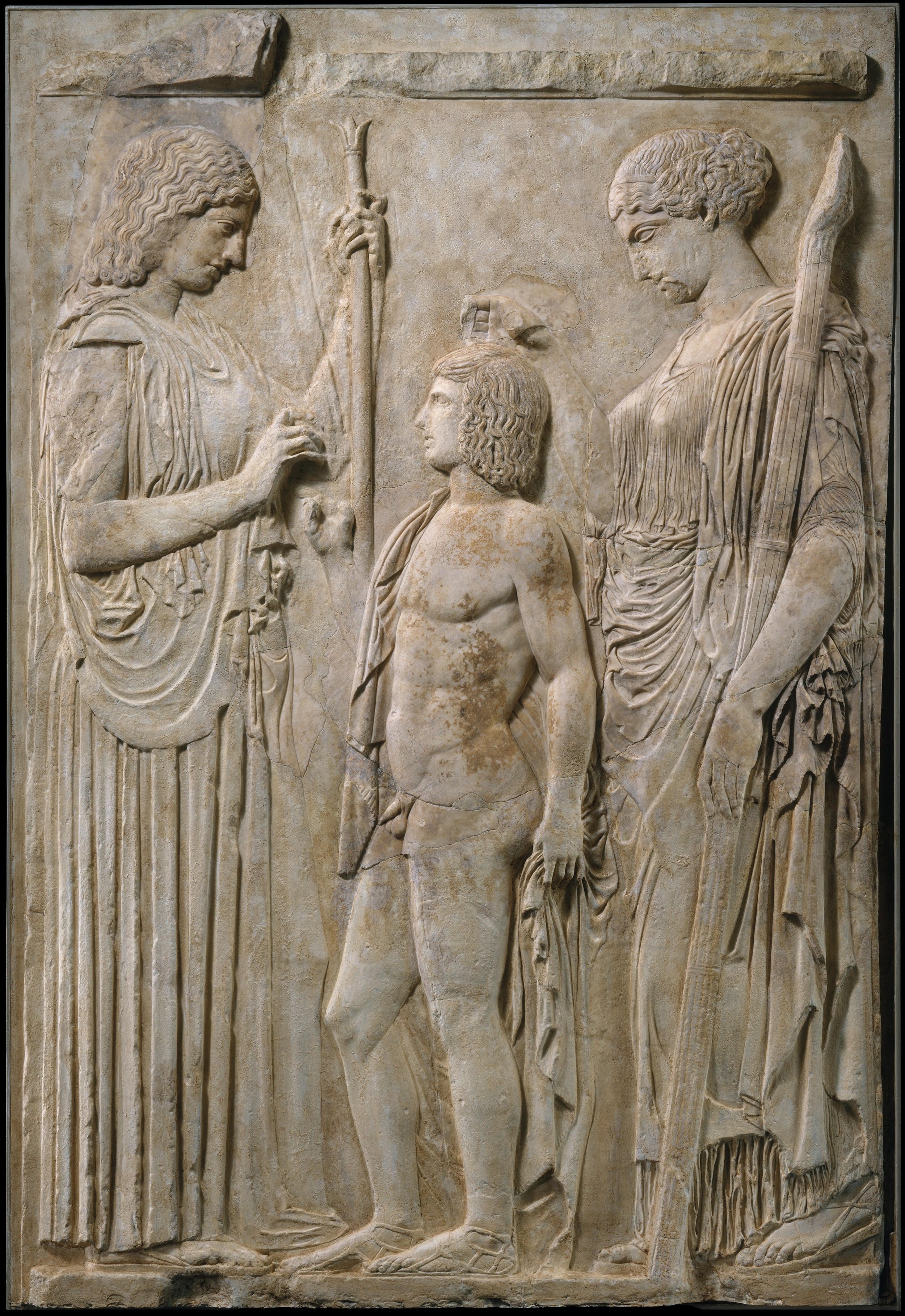 Roman marble fragments set into a cast of the Great Eleusinian Relief, showing Demeter and Persephone beside a youth.