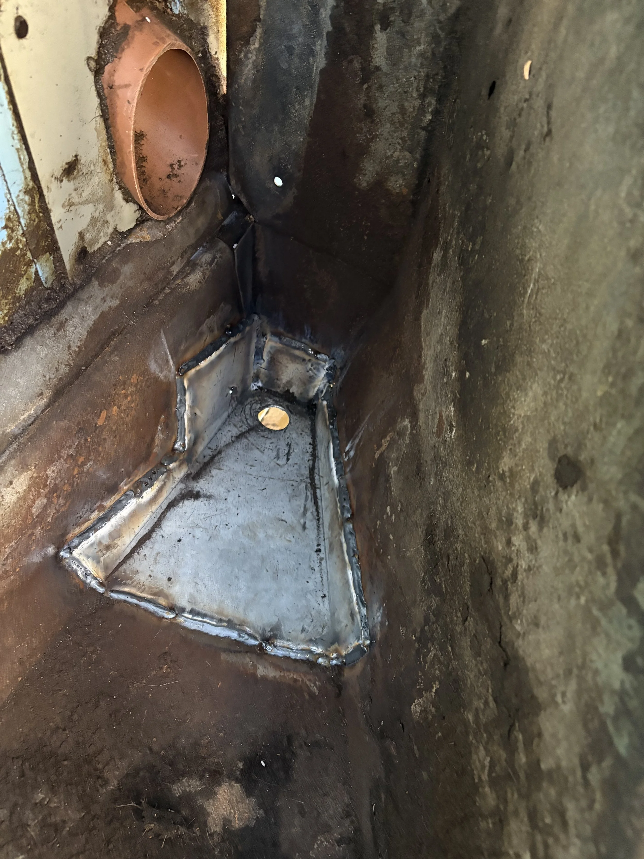 Milking parlor trough patch fabricated and welded into place.